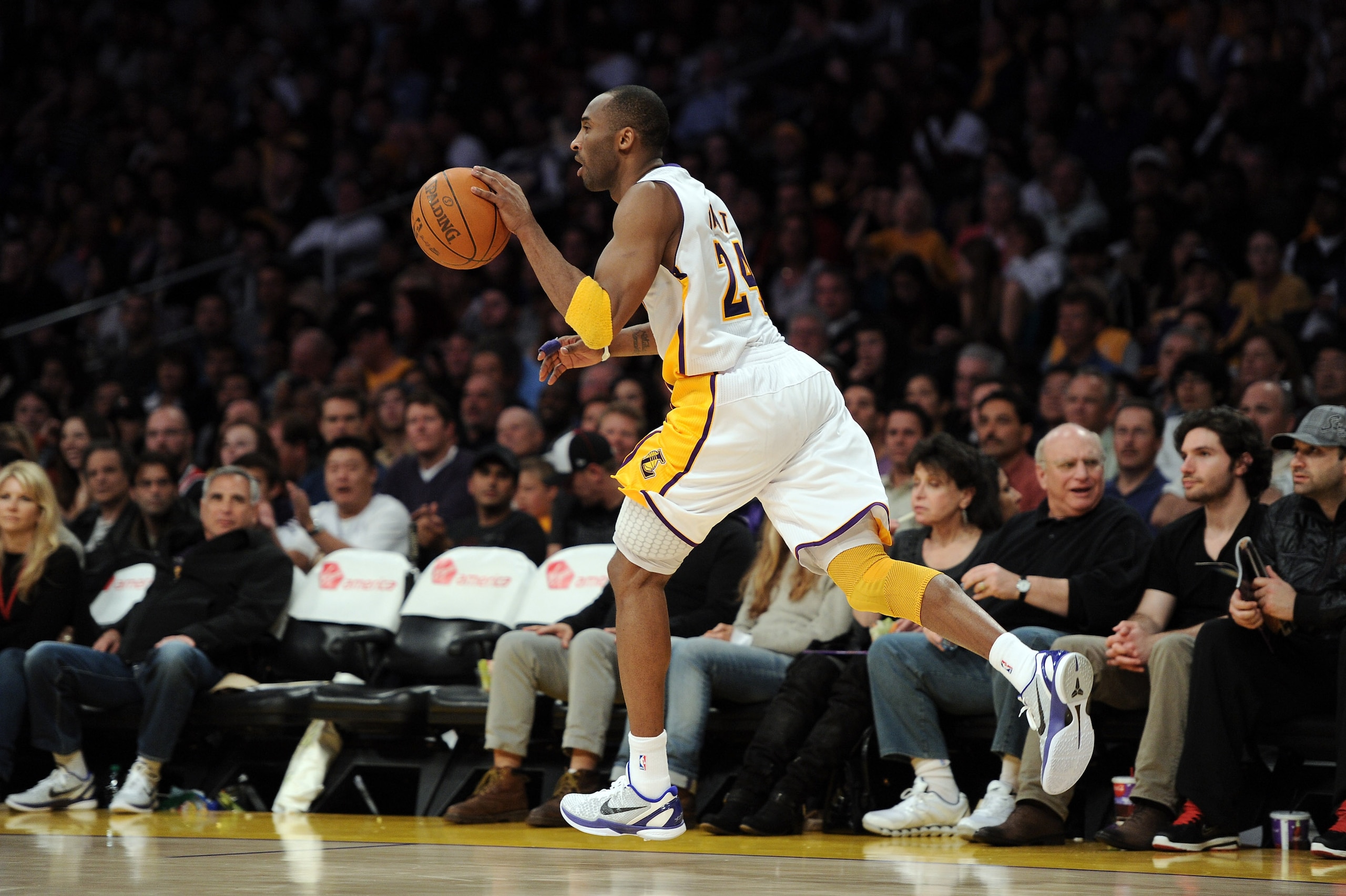 LOS ANGELES, CA - MARCH 20: Kobe Bryant #24 of the Los Angeles Lakers dribbles against the Portland Trail Blazers at the Staples Center on March 20, 2011 in Los Angeles, California. NOTE TO USER: User expressly acknowledges and agrees that, by downloadi LOS ANGELES, CA - MARCH 20: Kobe Bryant #24 of the Los Angeles Lakers dribbles against the Portland Trail Blazers at the Staples Center on March 20, 2011 in Los Angeles, California. NOTE TO USER: User expressly acknowledges and agrees that, by downloadi