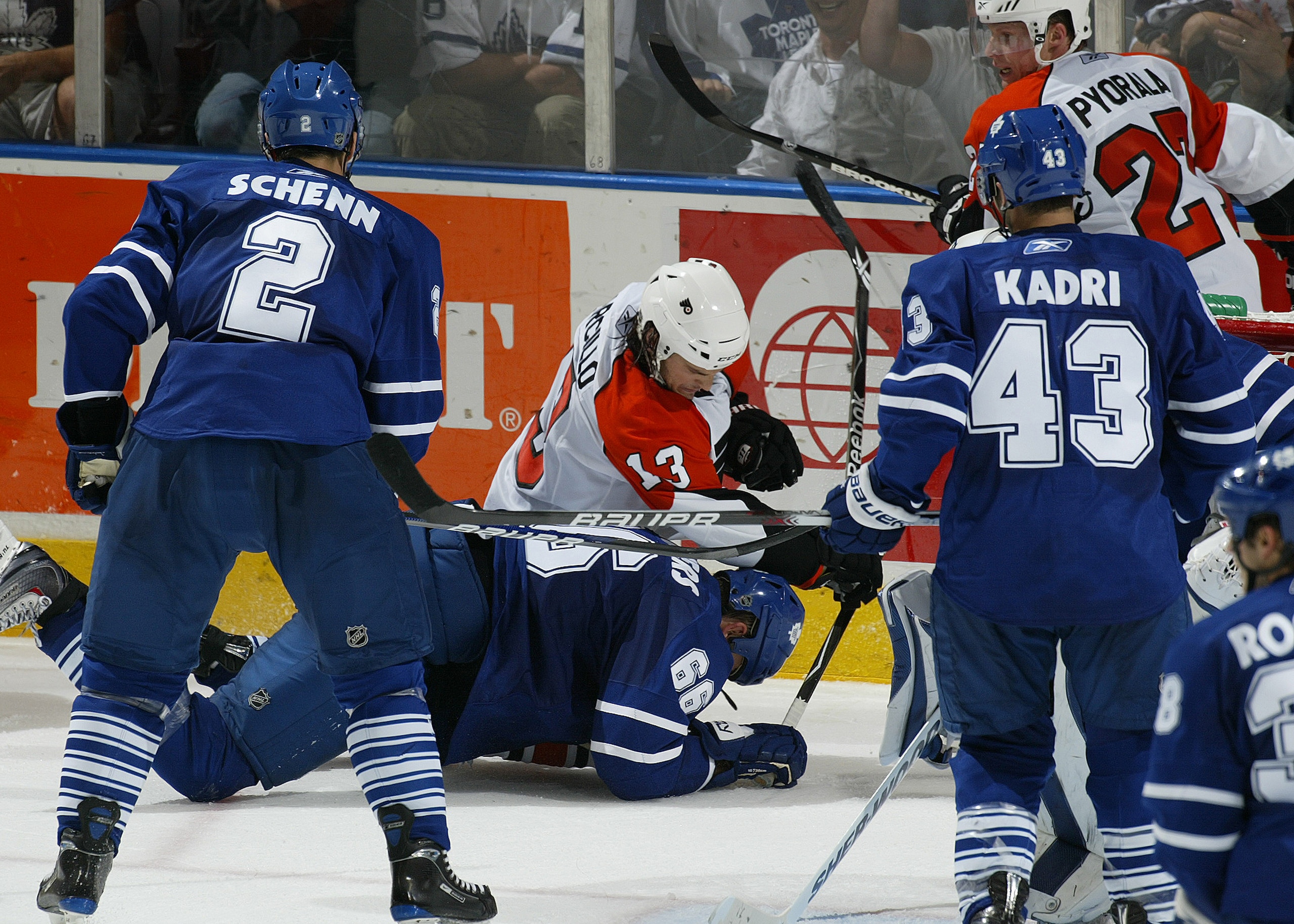 LONDON, ON - SEPTEMBER 17:  Andy Rogers #66 of the Toronto Maple Leafs takes a couple of punches from Danny Carcillo #13 of the Philadelphia Flyers in a preseason game on September 17, 2009 at the John Labatt Centre in London, Ontario. The Leafs defeated