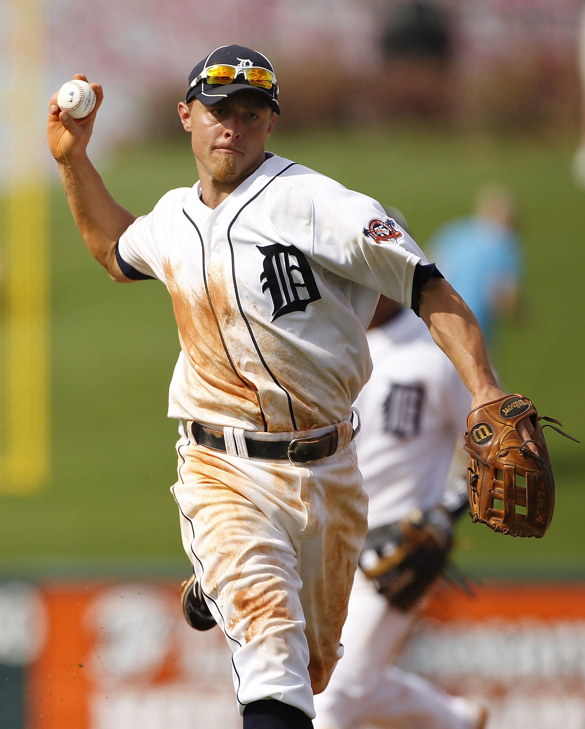 LAKELAND, FL - MARCH 01:  Brandon Inge #15 of the Detroit Tigers fields a ground ball during the third inning of the game against the Toronto Blue Jays at Joker Marchant Stadium on March 1, 2011 in Lakeland, Florida. The Tigers defeated the Blue Jays 6-2.