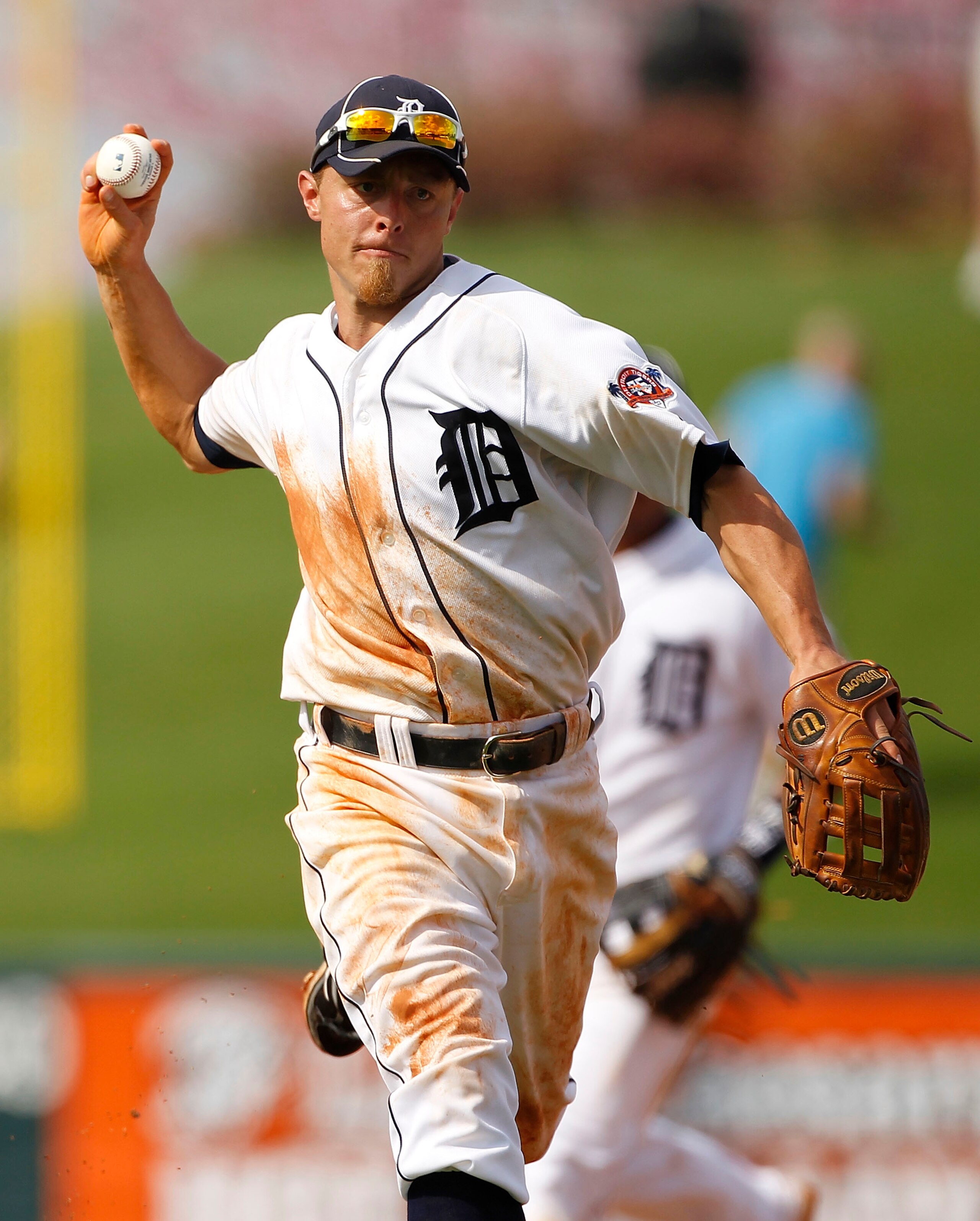 LAKELAND, FL - MARCH 01:  Brandon Inge #15 of the Detroit Tigers fields a ground ball during the third inning of the game against the Toronto Blue Jays at Joker Marchant Stadium on March 1, 2011 in Lakeland, Florida. The Tigers defeated the Blue Jays 6-2.