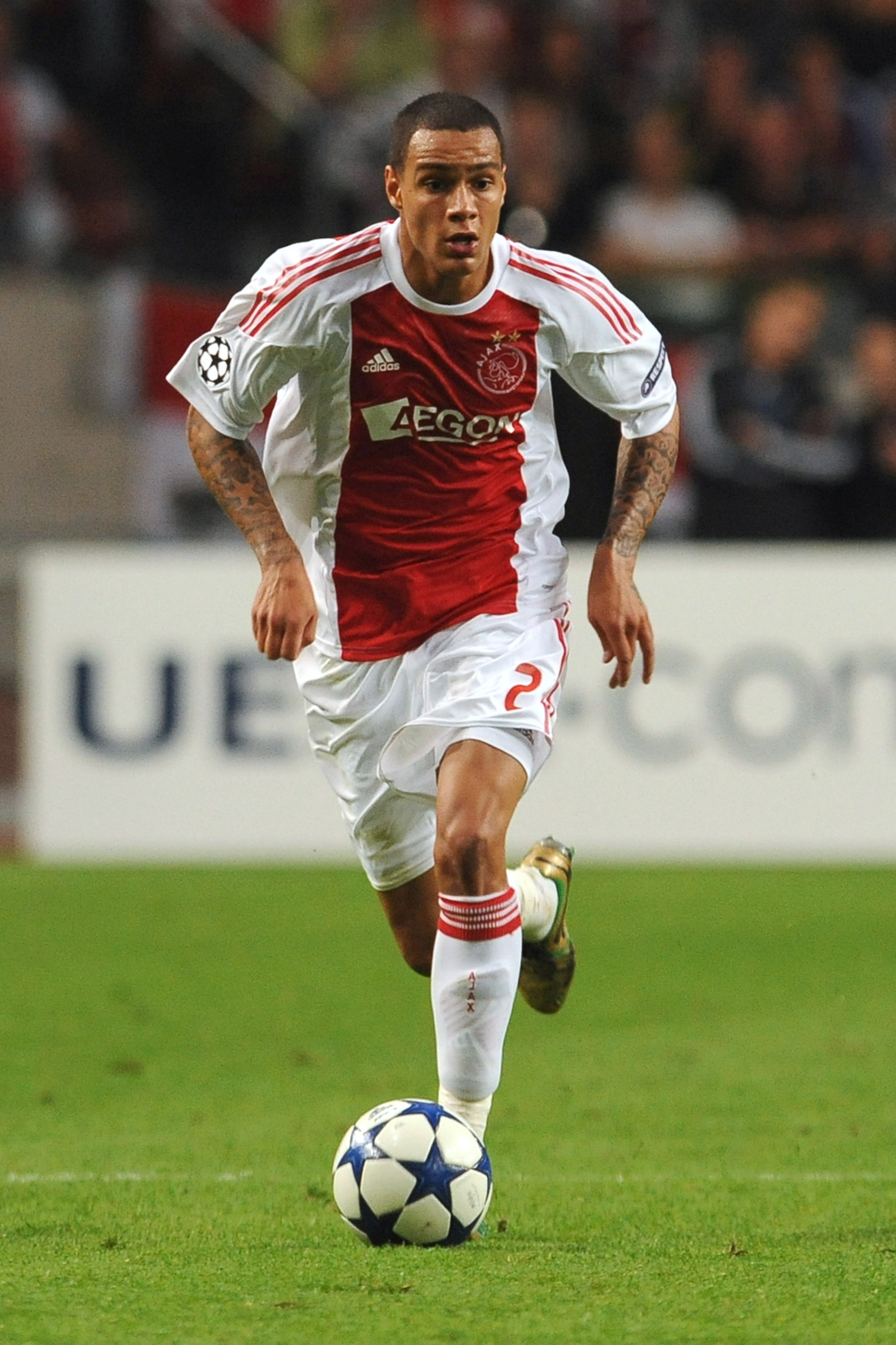 AMSTERDAM, NETHERLANDS - AUGUST 25: Gregory Van Der Wiel of AFC Ajax in action during the Champions League Play-off match between AFC Ajax and FC Dynamo Kiev at Amsterdam Arena on August 25, 2010 in Amsterdam, Netherlands. (Photo by Valerio Pennicino/Ge AMSTERDAM, NETHERLANDS - AUGUST 25: Gregory Van Der Wiel of AFC Ajax in action during the Champions League Play-off match between AFC Ajax and FC Dynamo Kiev at Amsterdam Arena on August 25, 2010 in Amsterdam, Netherlands. (Photo by Valerio Pennicino/Ge