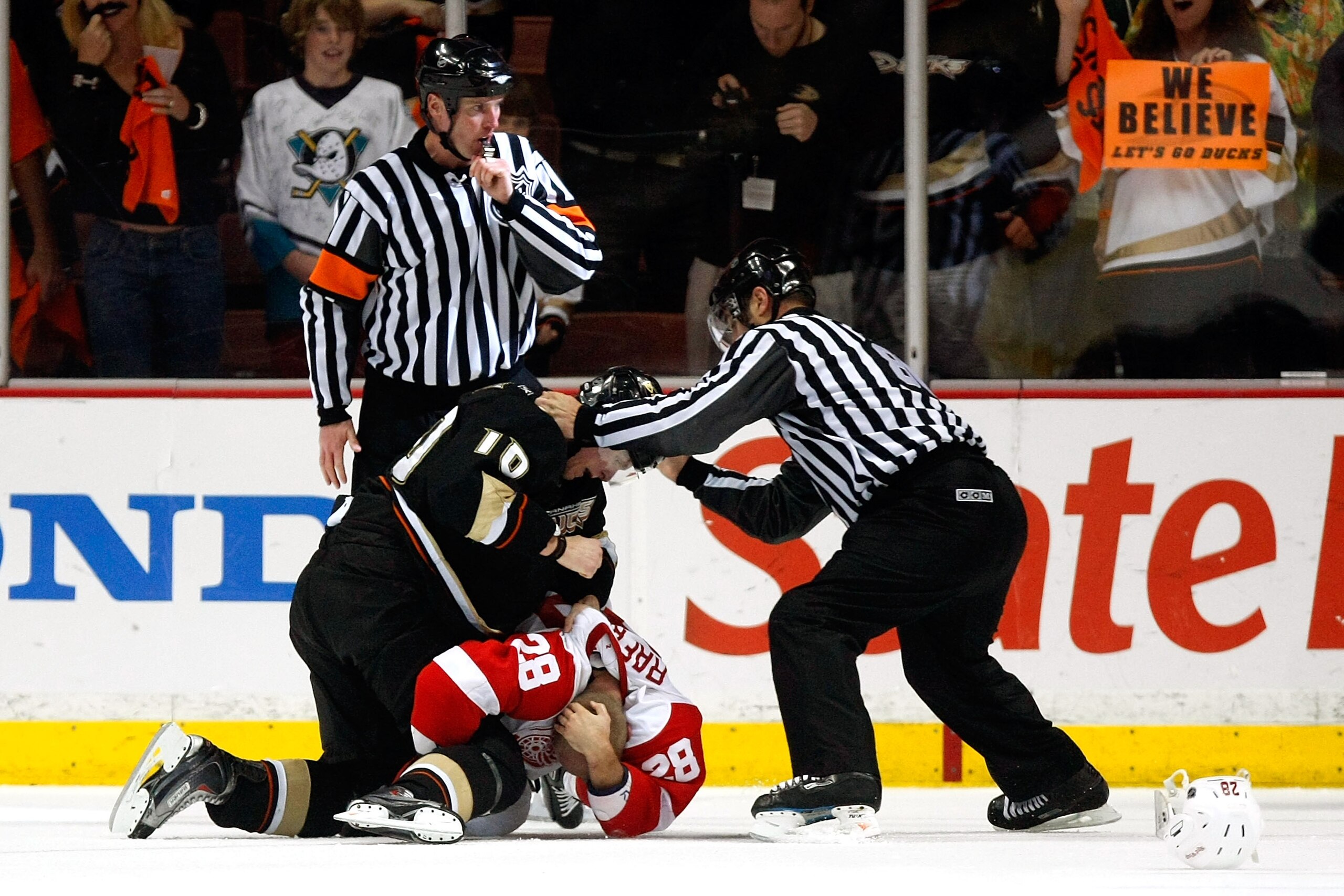 ANAHEIM, CA - MAY 12:  Corey Perry #10 of the Anaheim Ducks and Brian Rafalski #28 of the Detroit Red Wings fight after the Ducks win Game Six of the Western Conference Semifinal Round of the 2009 Stanley Cup Playoffs 2-1 at the Honda Center on May 12, 20