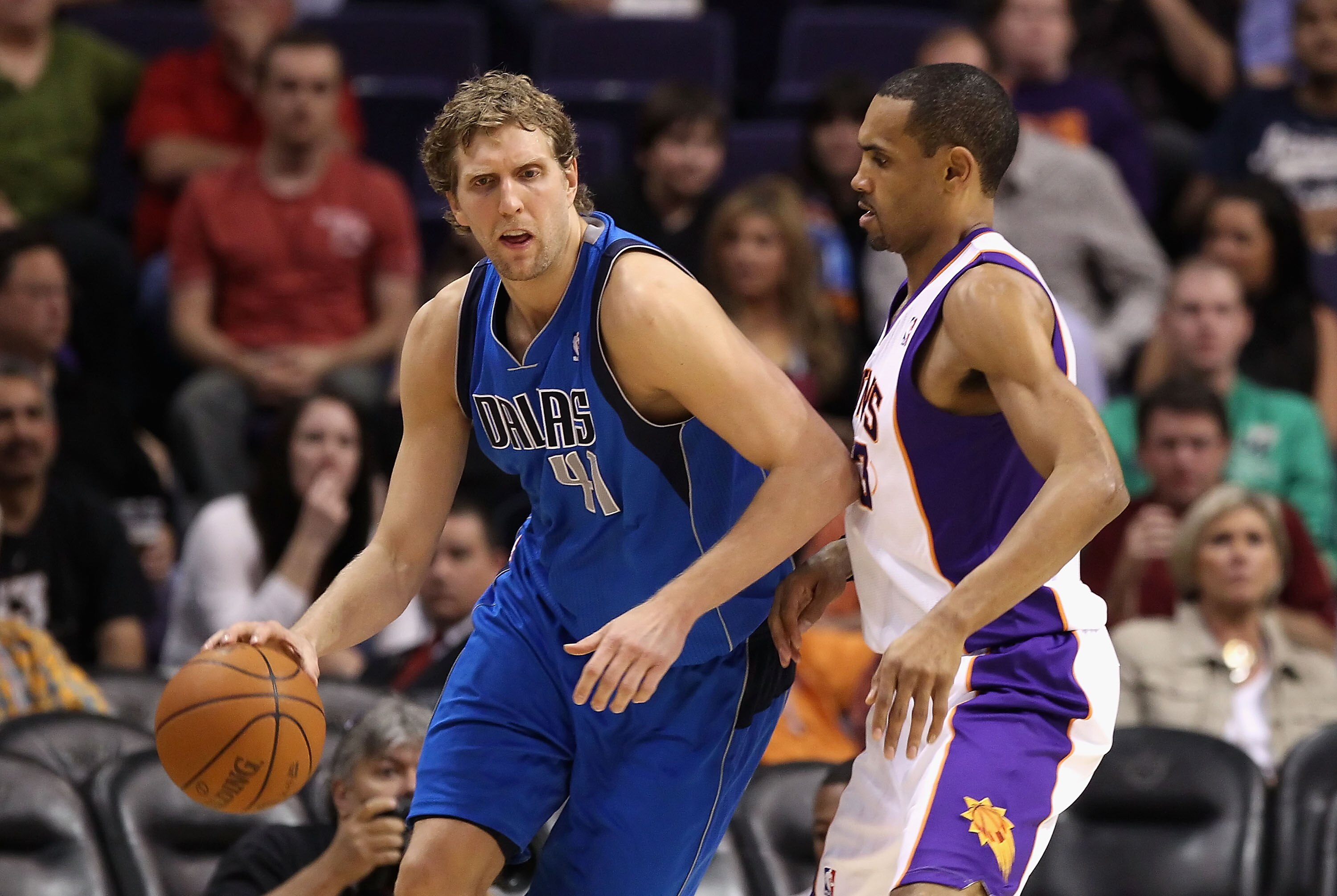 PHOENIX, AZ - MARCH 27:  Dirk Nowitzki #41 of the Dallas Mavericks handles the ball during the NBA game against the Phoenix Suns at US Airways Center on March 27, 2011 in Phoenix, Arizona.  The Mavericks defeated the Suns 91-83.  NOTE TO USER: User expres