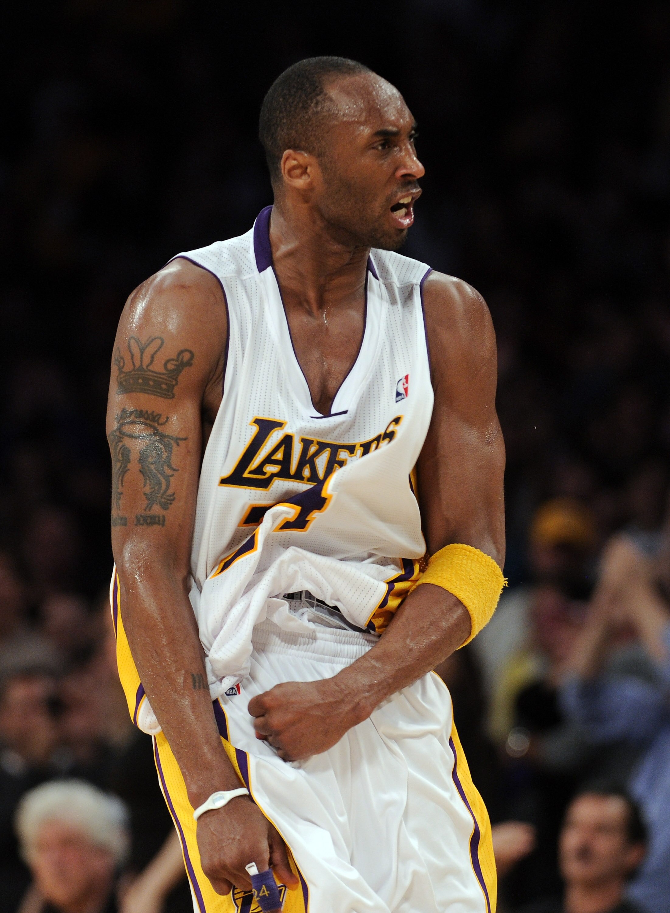 LOS ANGELES, CA - MARCH 20:  Kobe Bryant #24 of the Los Angeles Lakers celebrates his basket in the last minute on way to an 84-80 win over the  Portland Trail Blazers at the Staples Center on March 20, 2011 in Los Angeles, California.  NOTE TO USER: User