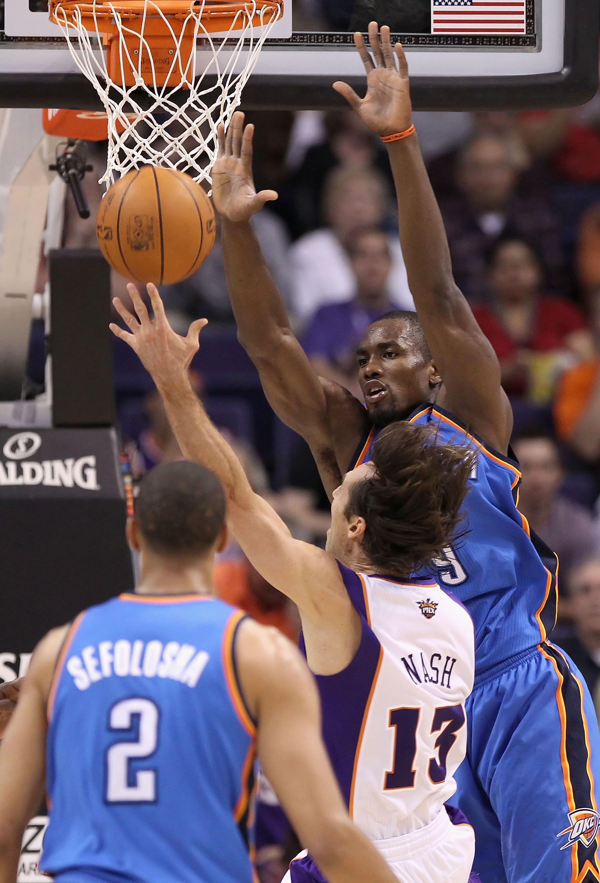PHOENIX, AZ - MARCH 30:  Steve Nash #13 of the Phoenix Suns puts up a shot during the NBA game against the Oklahoma City Thunder at US Airways Center on March 30, 2011 in Phoenix, Arizona.  The Thunder defeated the Suns 116-98. NOTE TO USER: User expressl