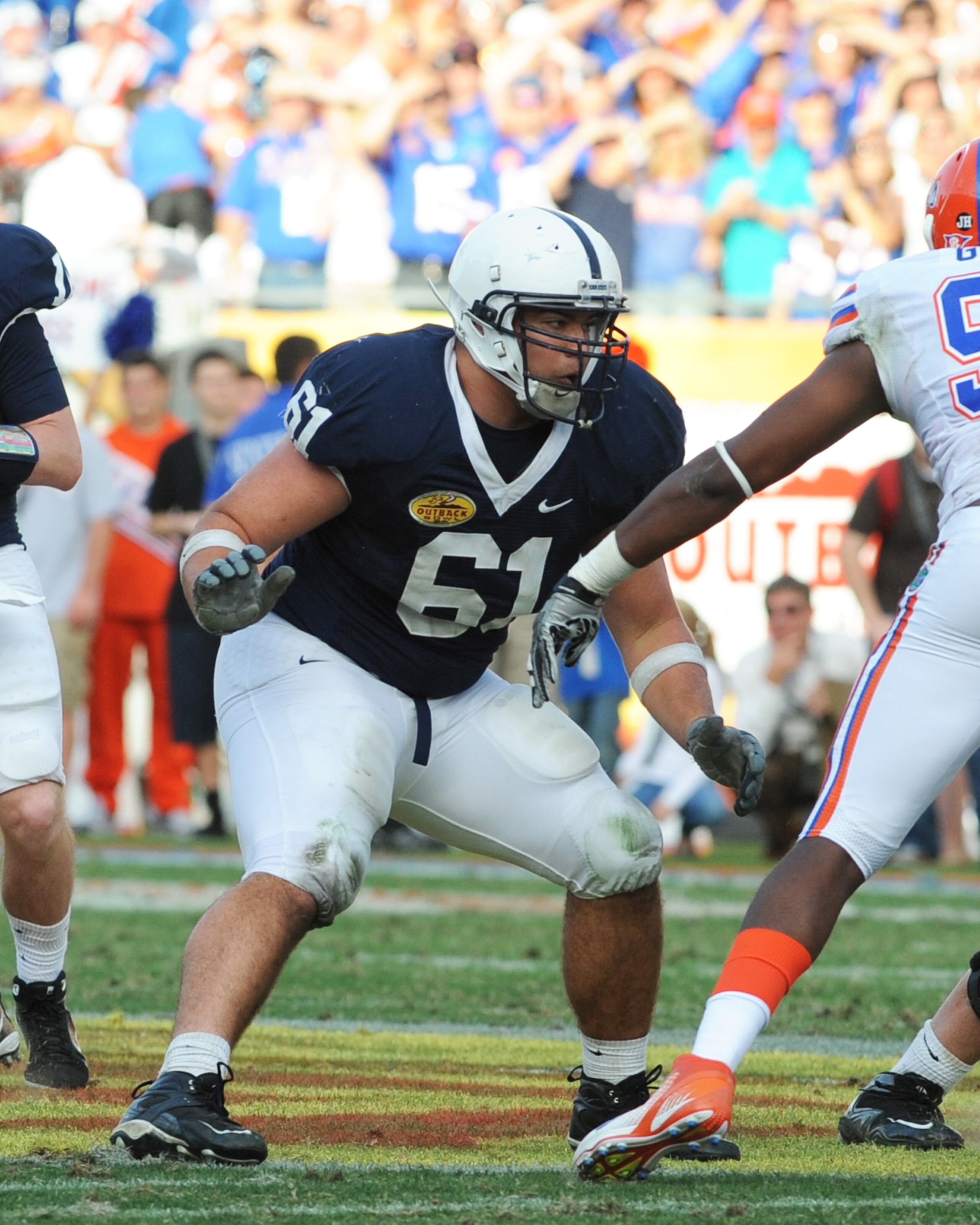 TAMPA, FL - JANUARY 1:  Guard Stefan Wisniewski #61 of the Penn State Nittany Lions blocks against the Florida Gators January 1, 2010 in the 25th Outback Bowl at Raymond James Stadium in Tampa, Florida.  (Photo by Al Messerschmidt/Getty Images)