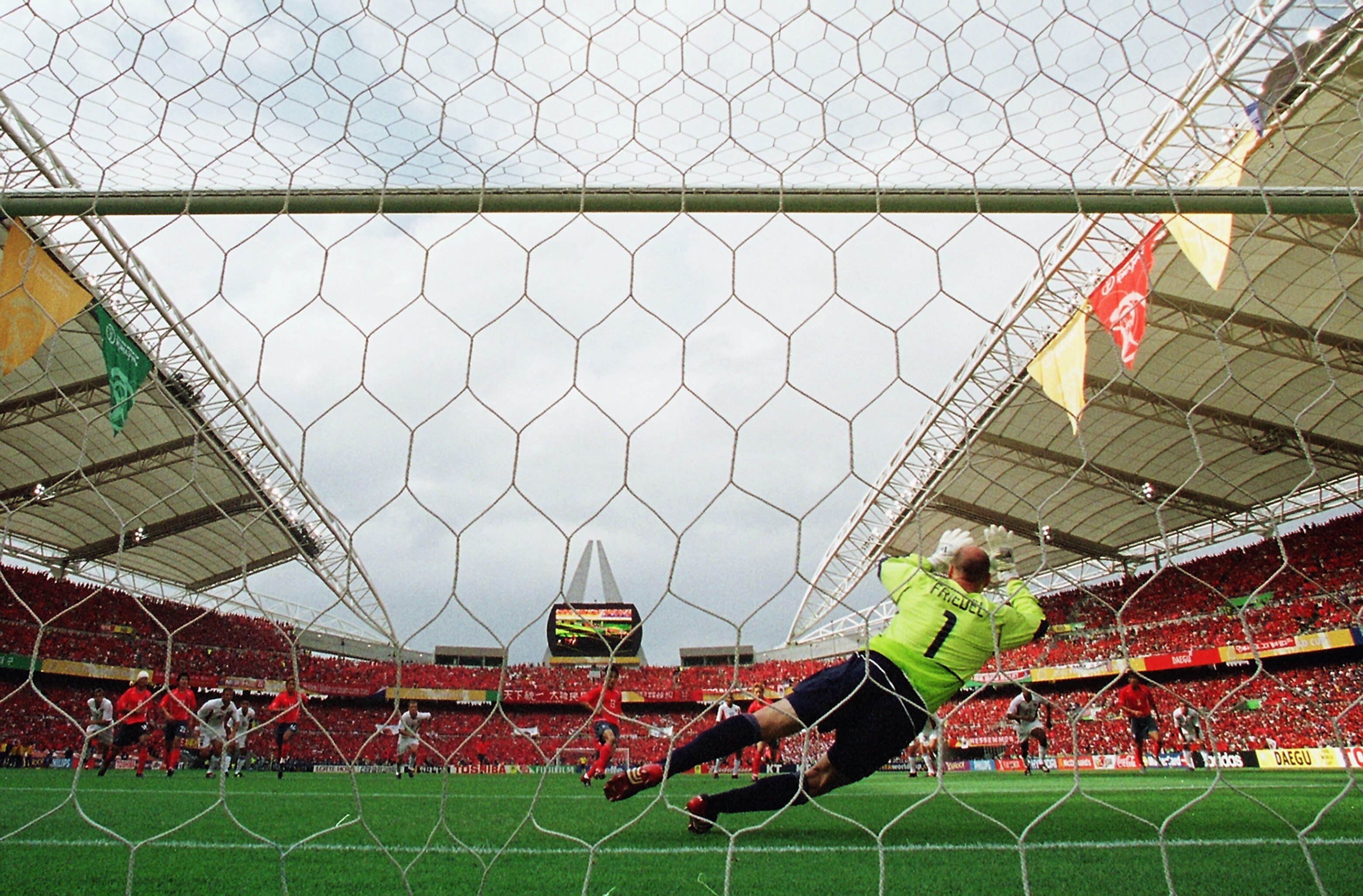 DAEGU - JUNE 10:  Brad Friedel of the USA saves a penalty from Eul Yong Lee of South Korea during the FIFA World Cup Finals 2002 Group D match played at the Daegu World Cup Stadium, in Daegu, South Korea on June 10, 2002. The match ended in a 1-1 draw. DI