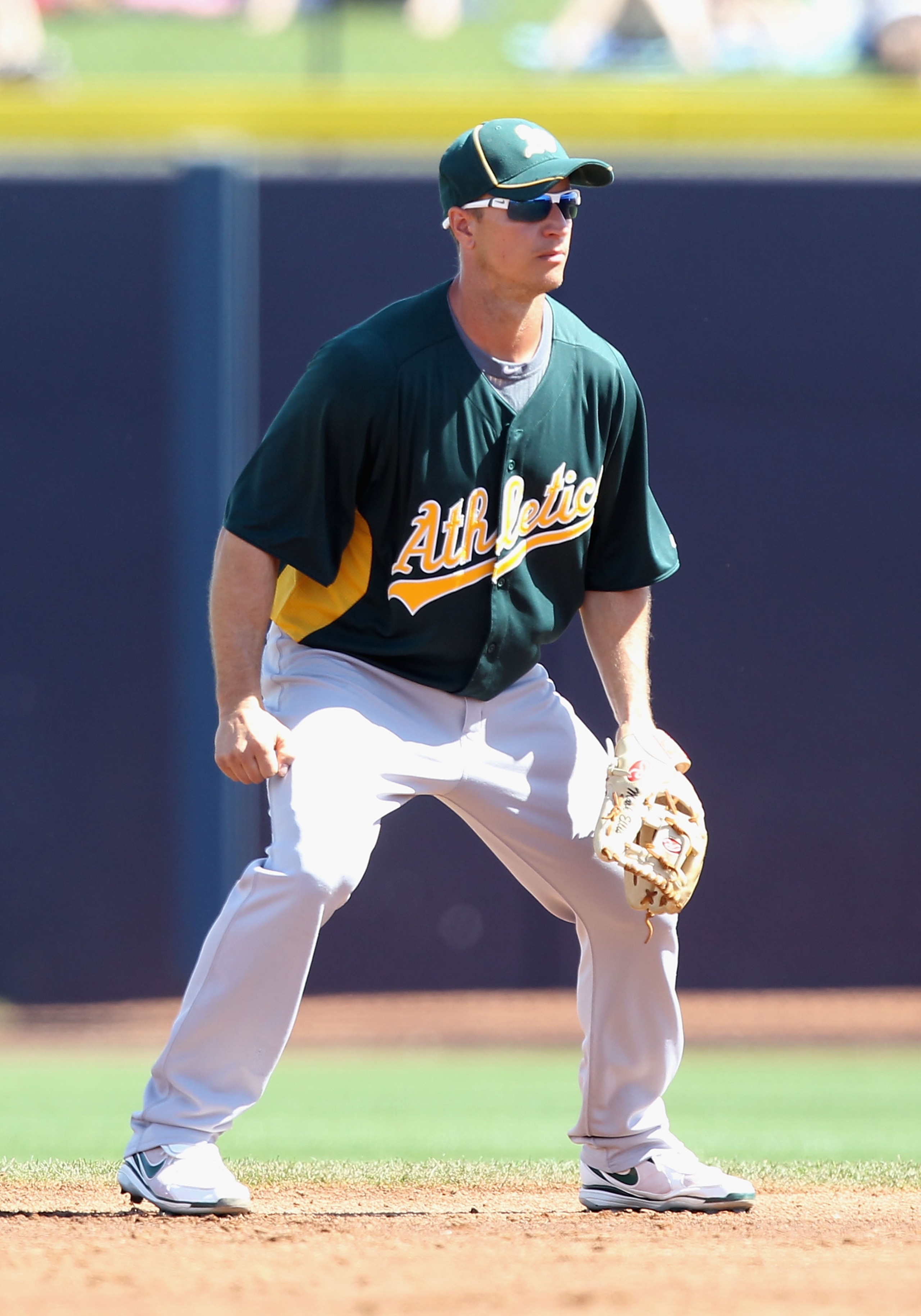 PEORIA, AZ - MARCH 12:  Infielder Mark Ellis #!4 of the Oakland Athletics during the spring training game against the Seattle Mariners at Peoria Stadium on March 12, 2011 in Peoria, Arizona.  (Photo by Christian Petersen/Getty Images)