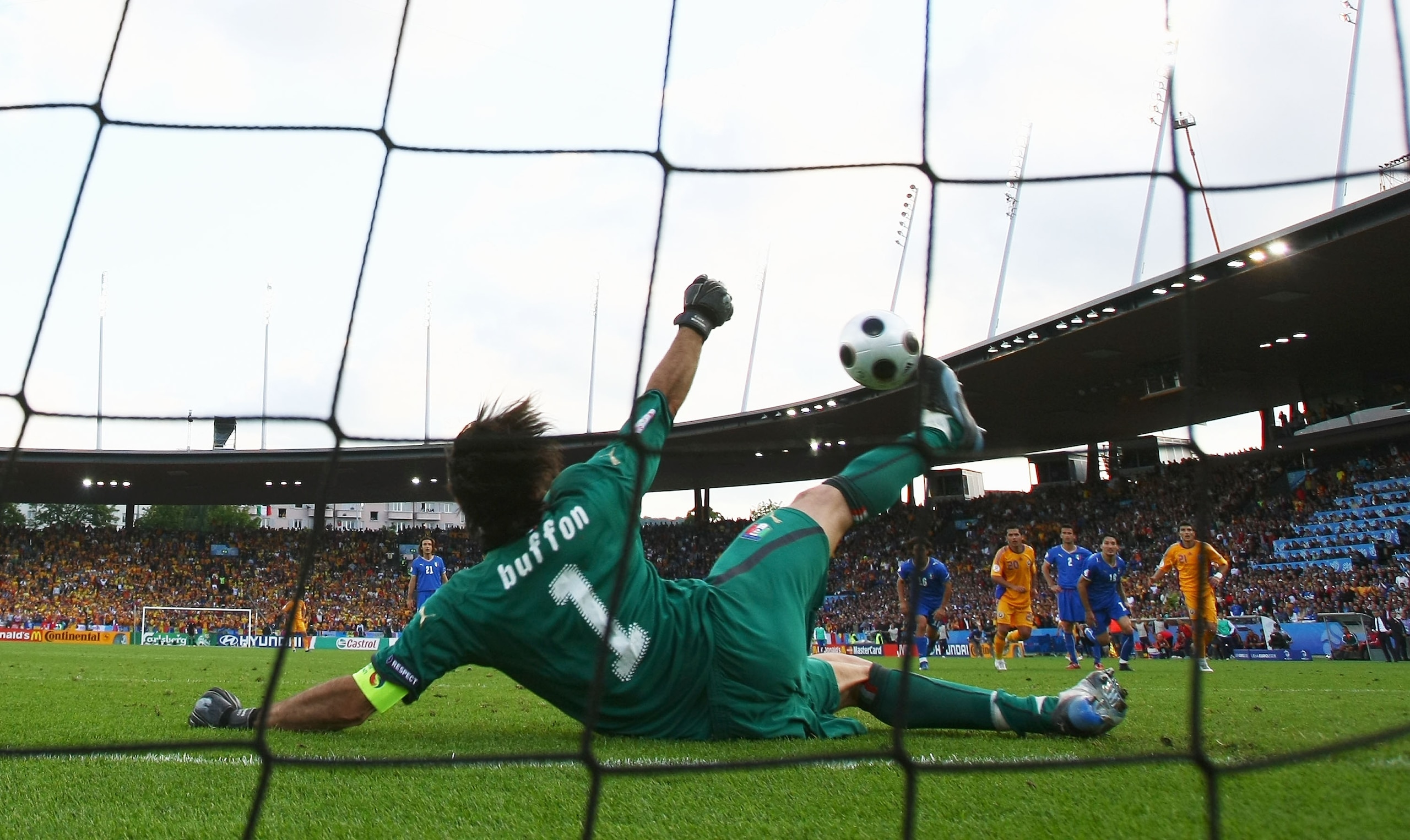ZURICH, SWITZERLAND - JUNE 13:  Goalkeeper Gianluigi Buffon (#1) of Italy saves the penalty taken by Adrian Mutu of Romania during the UEFA EURO 2008 Group C match between Italy and Romania at Letzigrund Stadion on June 13, 2008 in Zurich, Switzerland.  (