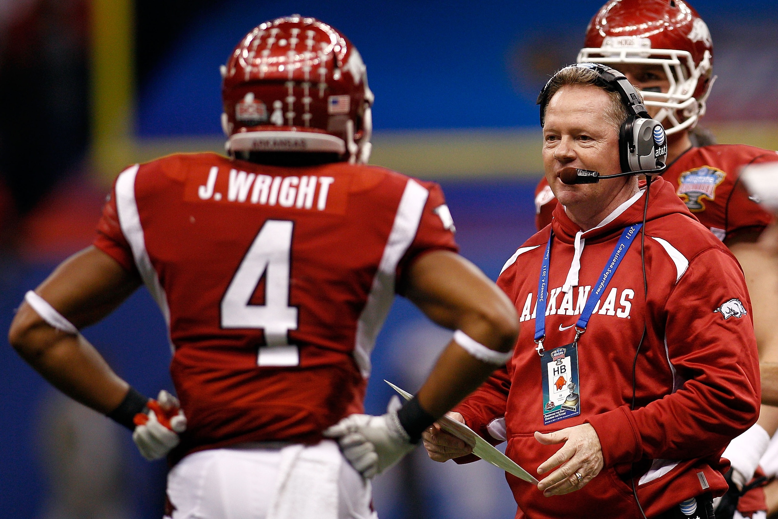 NEW ORLEANS, LA - JANUARY 04: Head coach Bobby Petrino of the Arkansas Razorbacks looks over at Jarius Wright #4 against the Ohio State Buckeyes during the Allstate Sugar Bowl at the Louisiana Superdome on January 4, 2011 in New Orleans, Louisiana. (Pho NEW ORLEANS, LA - JANUARY 04: Head coach Bobby Petrino of the Arkansas Razorbacks looks over at Jarius Wright #4 against the Ohio State Buckeyes during the Allstate Sugar Bowl at the Louisiana Superdome on January 4, 2011 in New Orleans, Louisiana. (Pho