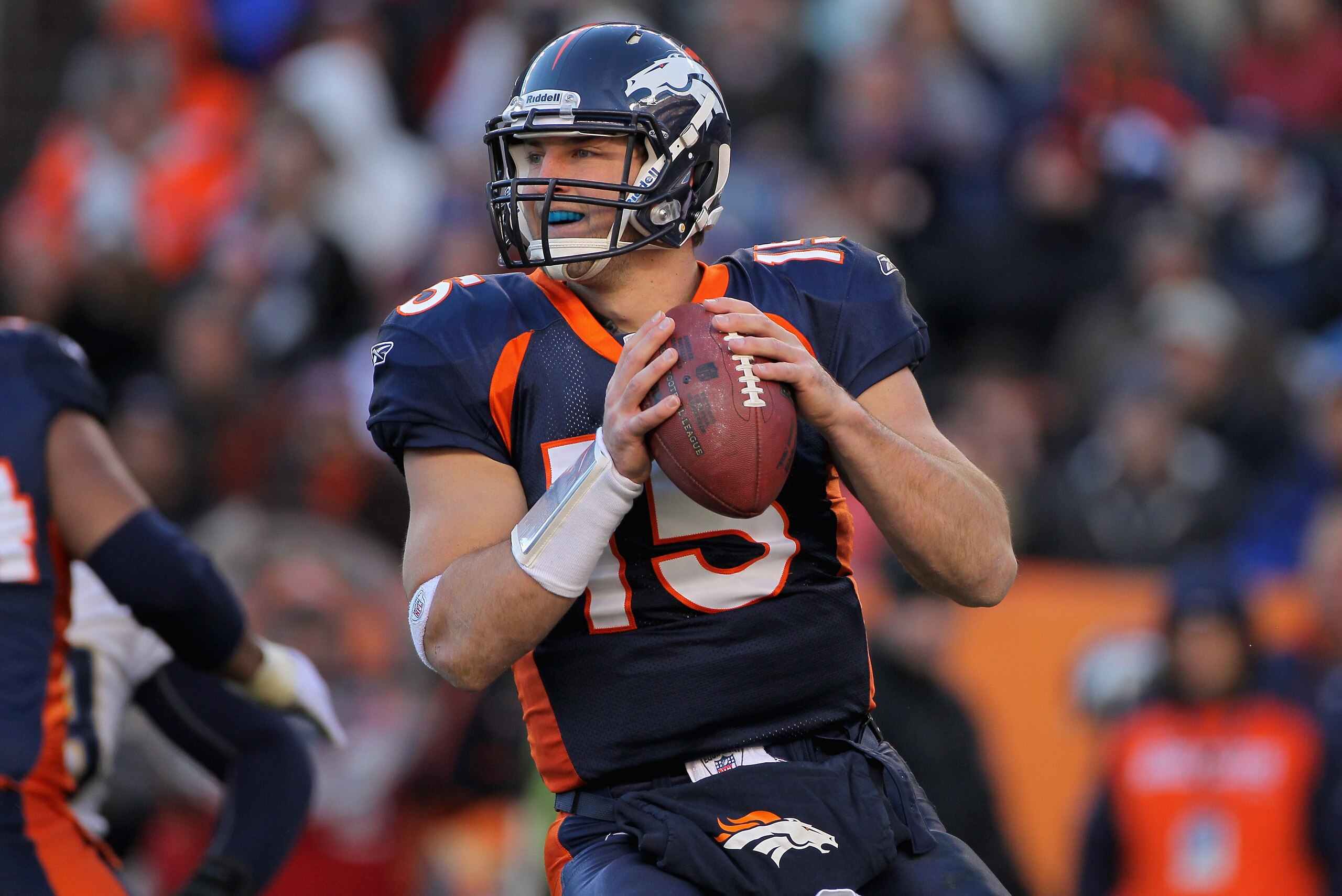 DENVER - JANUARY 02: Quarterback Tim Tebow #15 of the Denver Broncos looks to deliver a pass against the San Diego Chargers at INVESCO Field at Mile High on January 2, 2011 in Denver, Colorado. (Photo by Doug Pensinger/Getty Images) DENVER - JANUARY 02: Quarterback Tim Tebow #15 of the Denver Broncos looks to deliver a pass against the San Diego Chargers at INVESCO Field at Mile High on January 2, 2011 in Denver, Colorado. (Photo by Doug Pensinger/Getty Images)