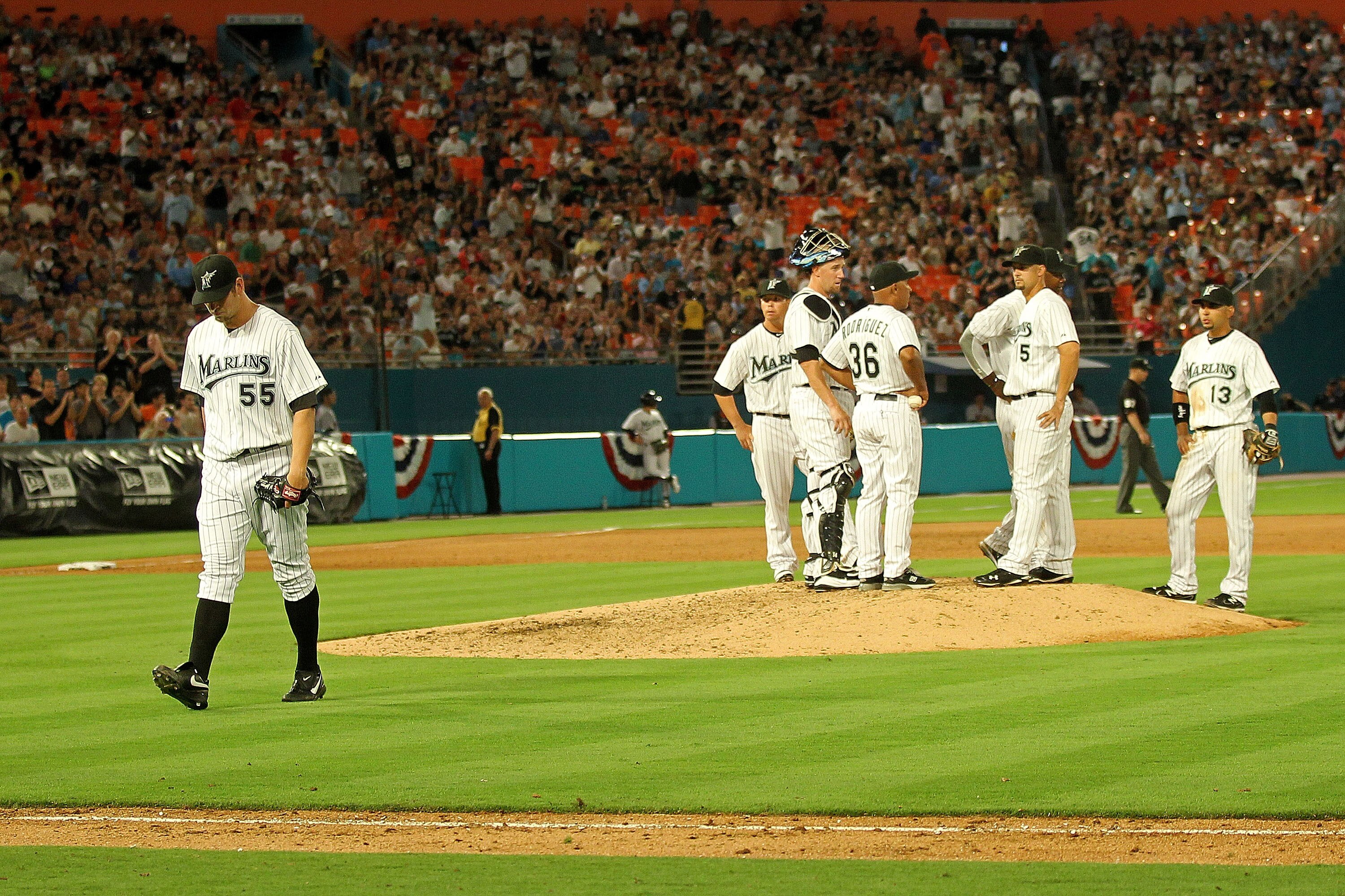 MIAMI GARDENS, FL - APRIL 01:  Josh Johnson #55 of the Florida Marlins walks off the mound during opening day against the New York Mets at Sun Life Stadium on April 1, 2011 in Miami Gardens, Florida.  (Photo by Mike Ehrmann/Getty Images)
