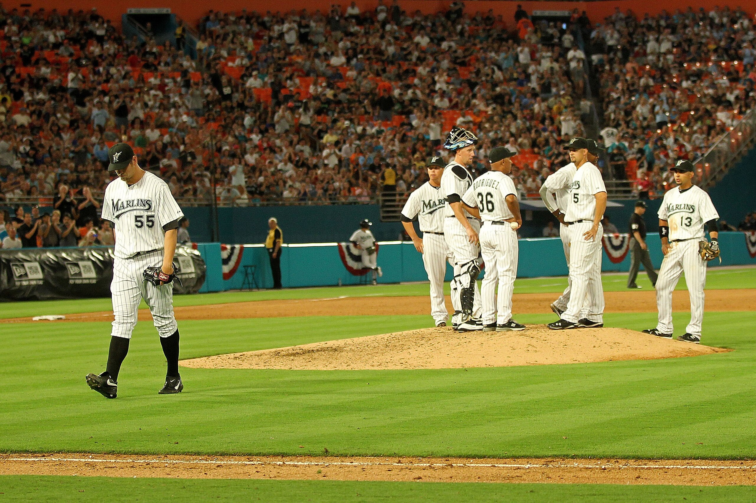 MIAMI GARDENS, FL - APRIL 01:  Josh Johnson #55 of the Florida Marlins walks off the mound during opening day against the New York Mets at Sun Life Stadium on April 1, 2011 in Miami Gardens, Florida.  (Photo by Mike Ehrmann/Getty Images)