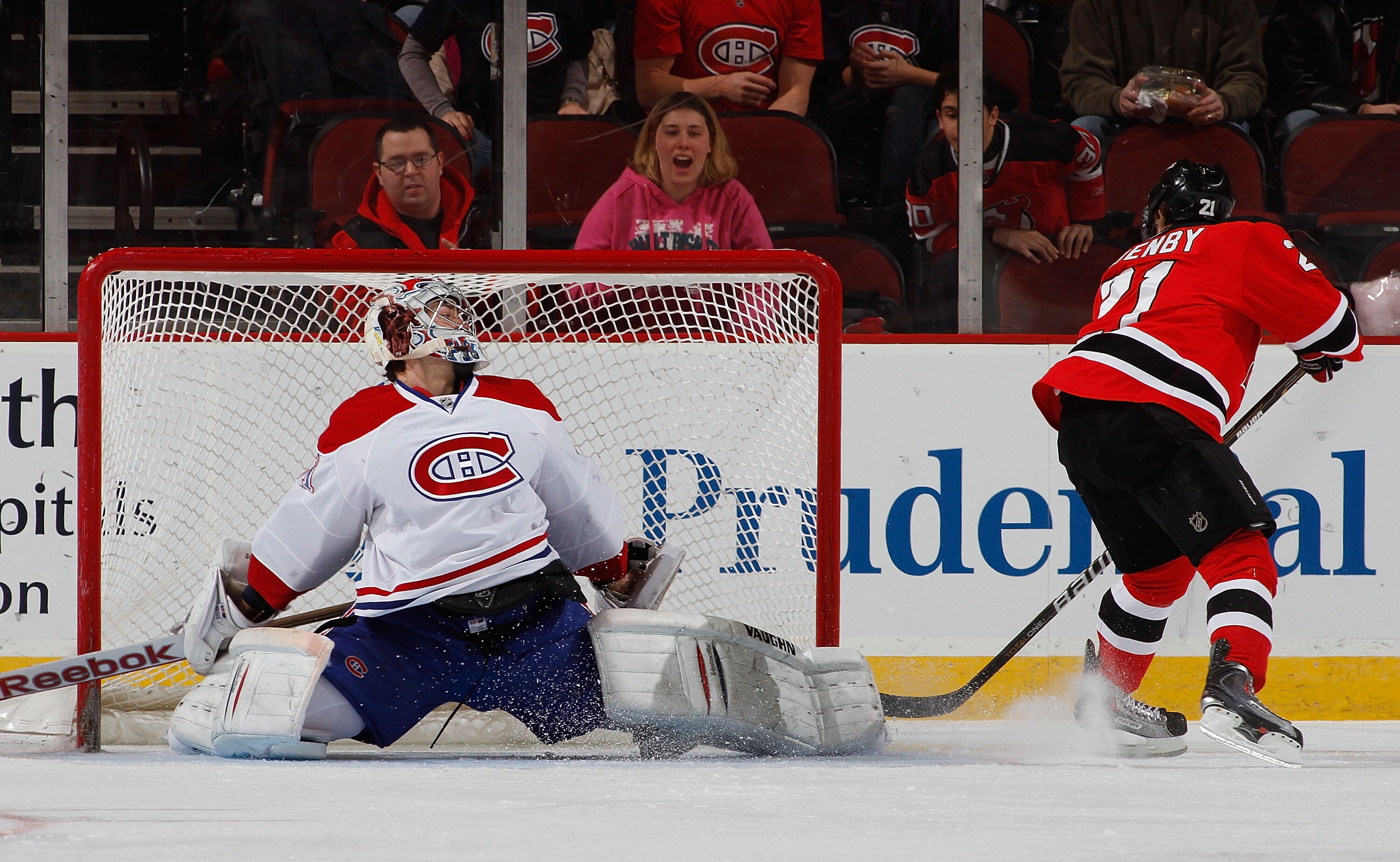 NEWARK, NJ - APRIL 02:  Goalie Carey Price #31 of the Montreal Canadians blocks this penalty shot with his leg as Mattias Tedenby #21 of the New Jersey Devils faked and tried to put it in next to the post during the first period of an NHL hockey game at t