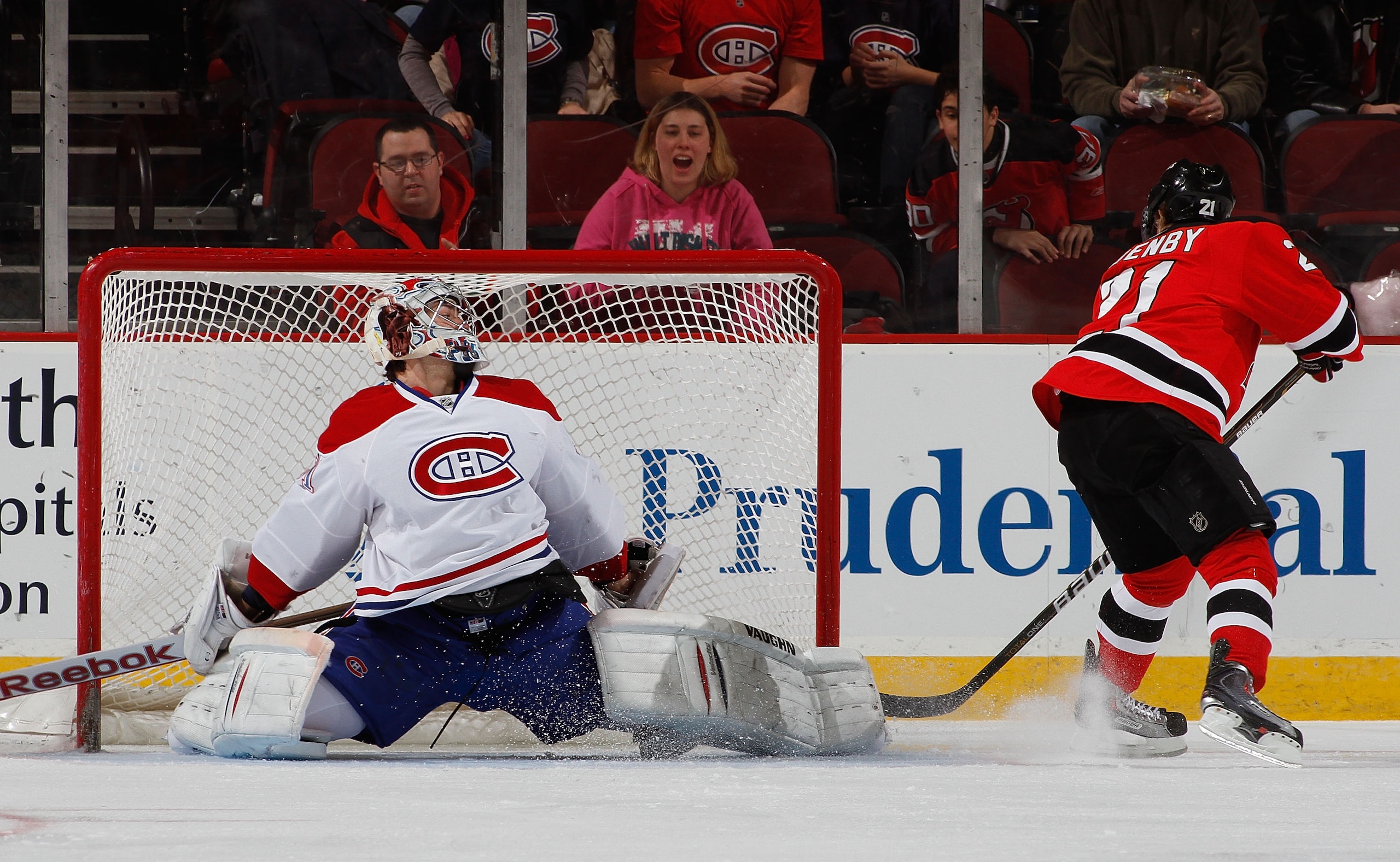 NEWARK, NJ - APRIL 02:  Goalie Carey Price #31 of the Montreal Canadians blocks this penalty shot with his leg as Mattias Tedenby #21 of the New Jersey Devils faked and tried to put it in next to the post during the first period of an NHL hockey game at t