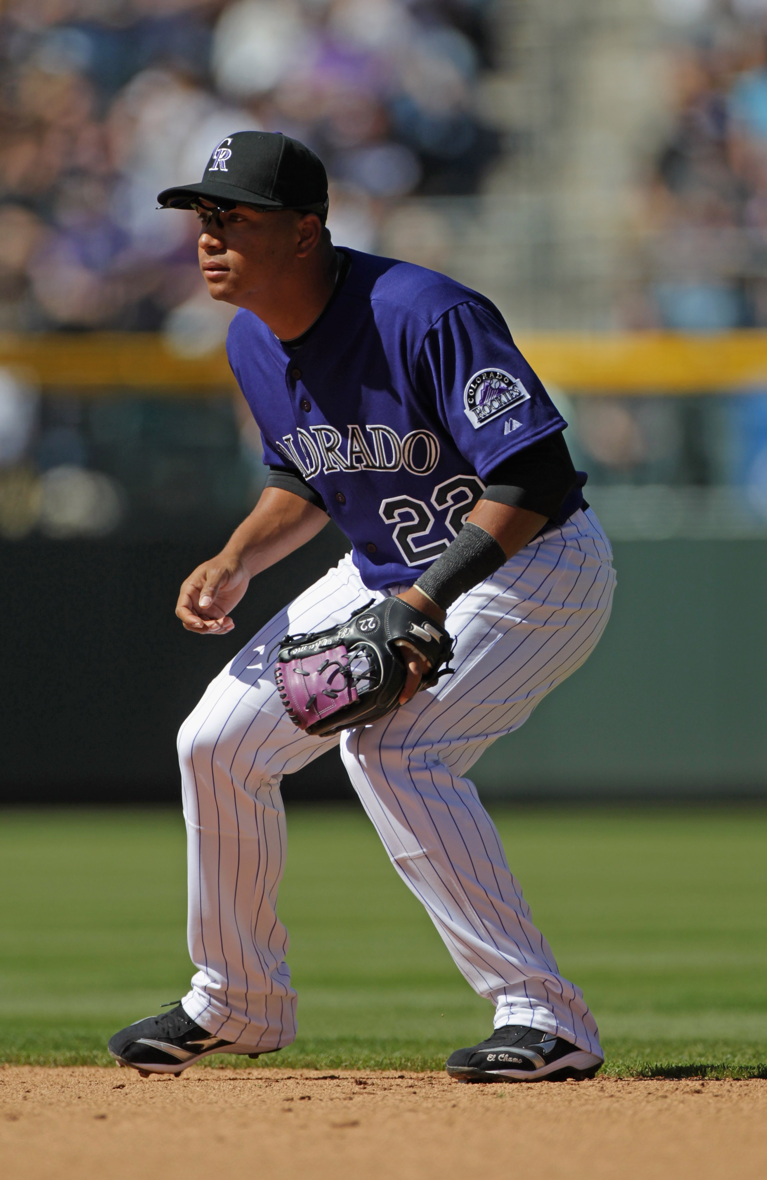 DENVER, CO - APRIL 01:  Second baseman Jose Lopez #22 of the Colorado Rockies plays defense against the Arizona Diamondbacks during Opening Day at Coors Field on April 1, 2011 in Denver, Colorado.  (Photo by Doug Pensinger/Getty Images)