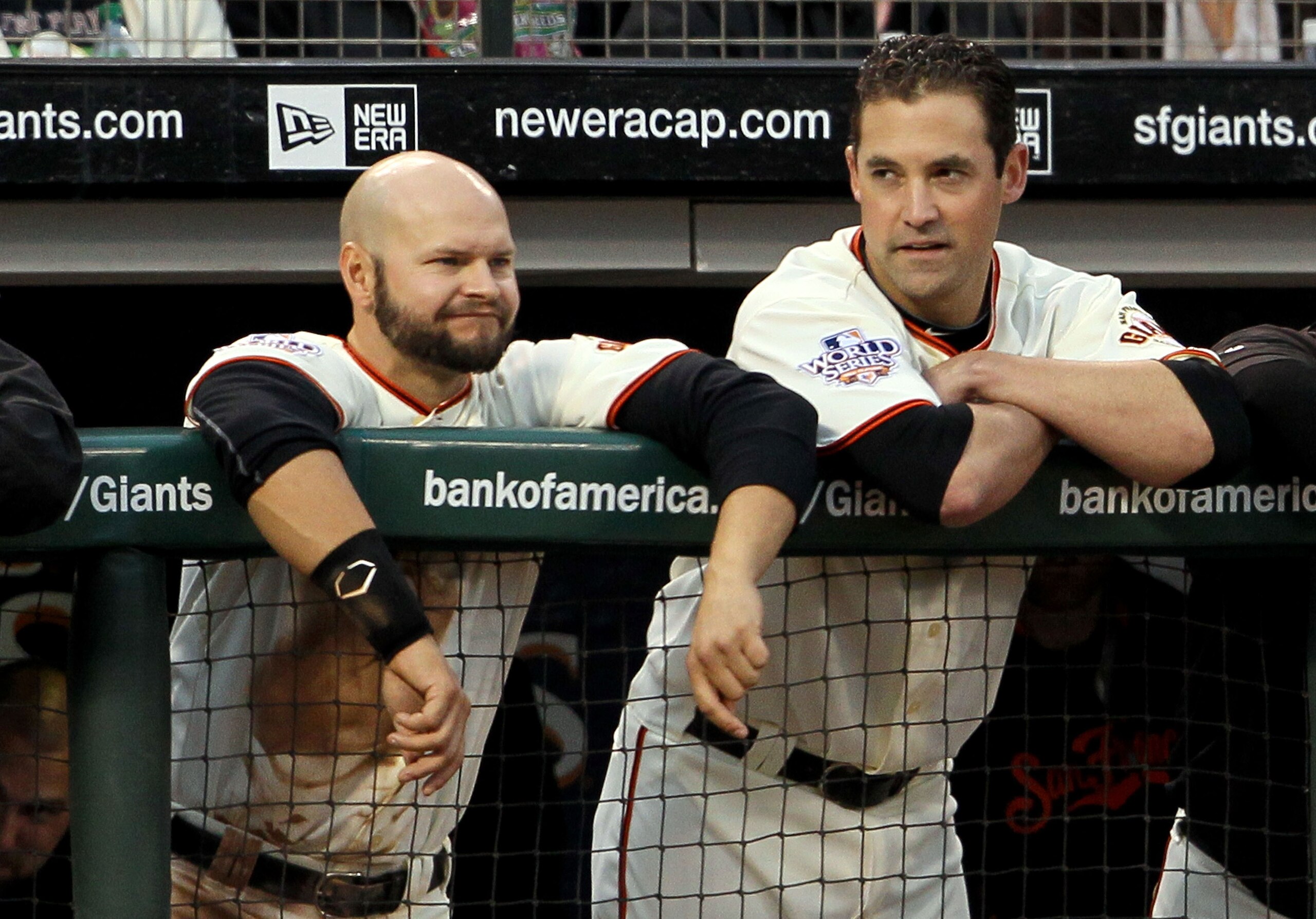 SAN FRANCISCO - OCTOBER 28:  (L-R) Cody Ross #13 and Pat Burrell #9 of the San Francisco Giants lean on the dugout fence while taking on the Texas Rangers in Game Two of the 2010 MLB World Series at AT&T Park on October 28, 2010 in San Francisco, Californ