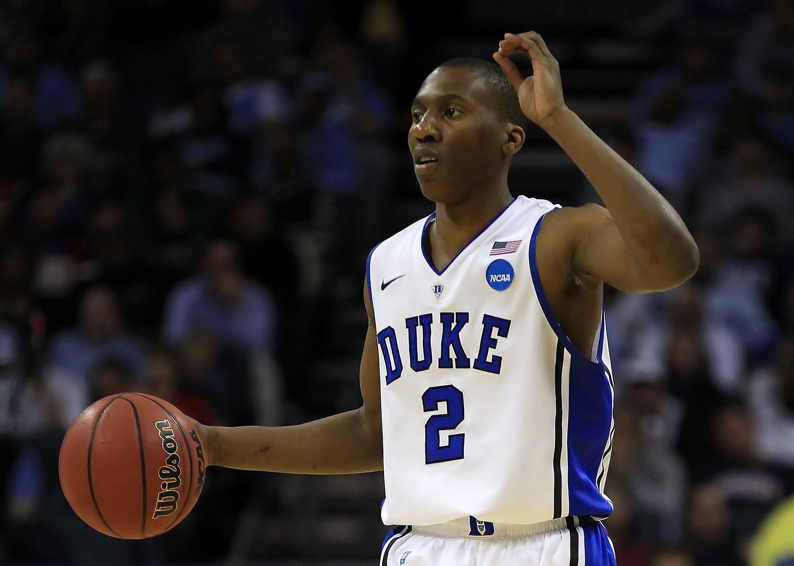 CHARLOTTE, NC - MARCH 20:  Nolan Smith #2 of the Duke Blue Devils moves the ball while taking on the Michigan Wolverines during the third round of the 2011 NCAA men's basketball tournament at Time Warner Cable Arena on March 20, 2011 in Charlotte, North C