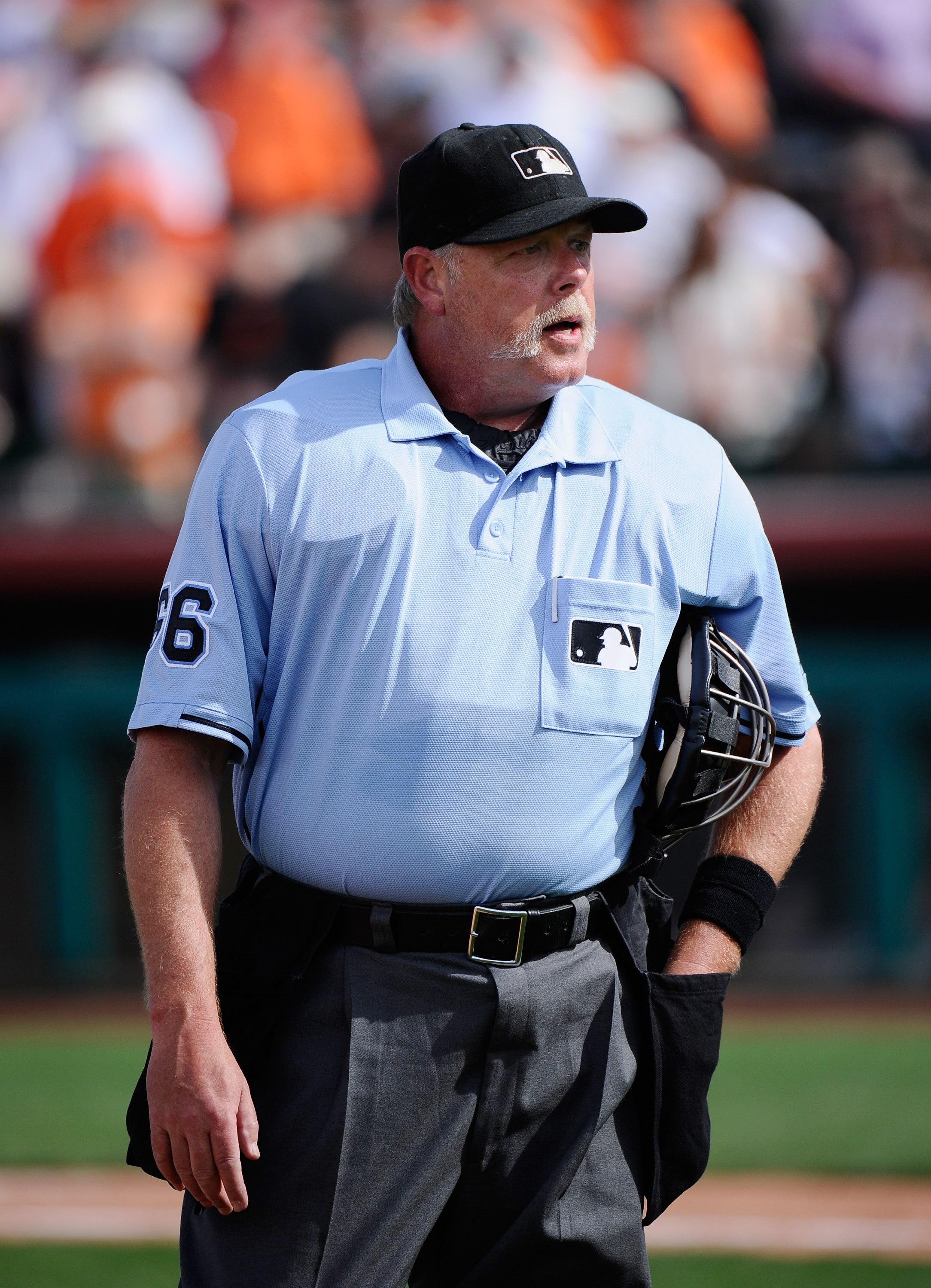 SCOTTSDALE, AZ - MARCH 18:  Home plate umpire Jim Joyce #66 argues strikes and balls with Juan Uribe #5 of the Los Angeles Dodgers  after Uribe was called out on strikes against the San Francisco Giants during the seventh inning of the baseball game at Sc