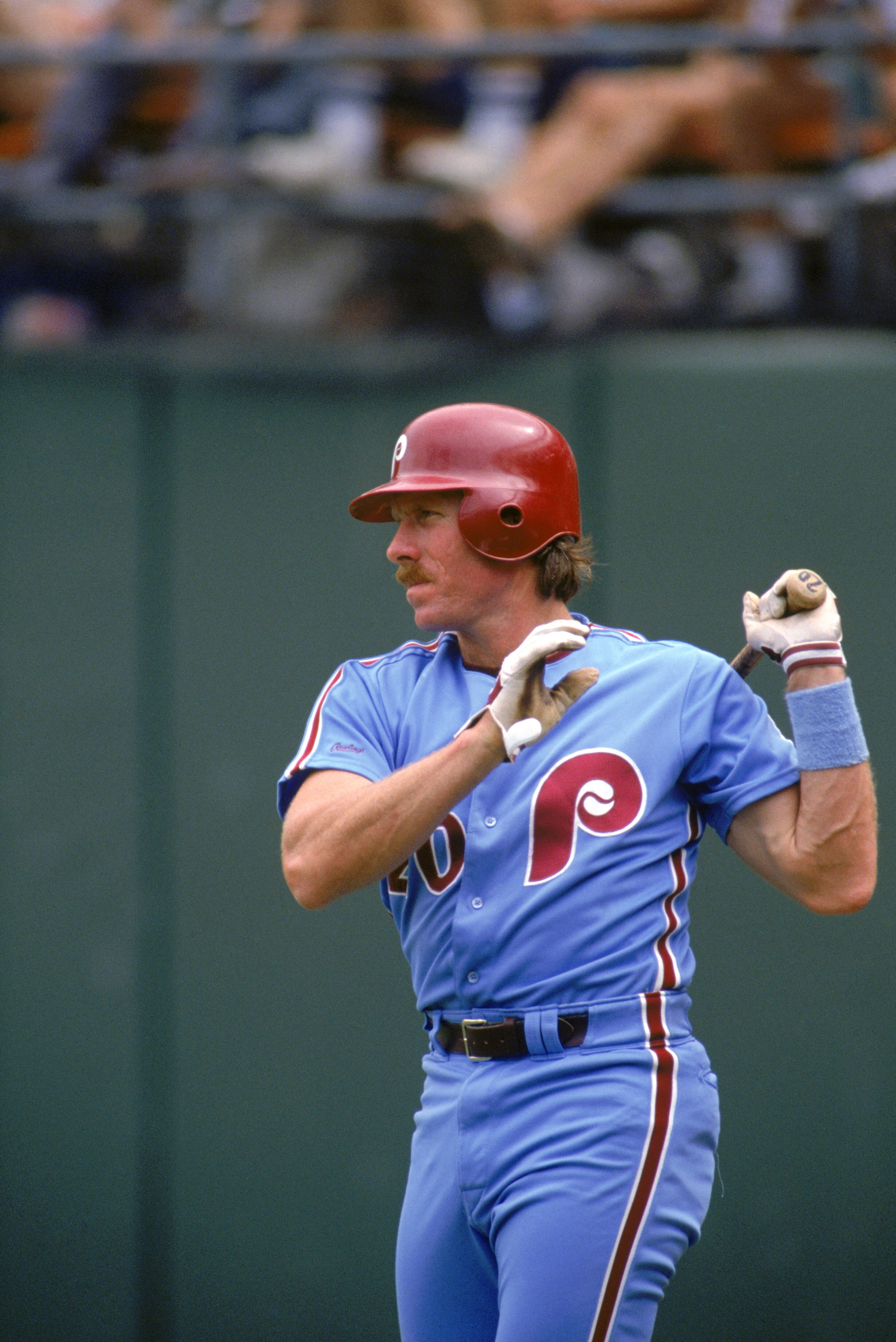PITTSBURGH - 1986:  Mike Schmidt #20 of the Philadelphia Phillies swings his bat during a 1986 season game against the Pittsburgh Pirates at Three Rivers Stadium in Pittsburgh, Pennsylvania. (Photo by Rick Stewart/Getty Images)