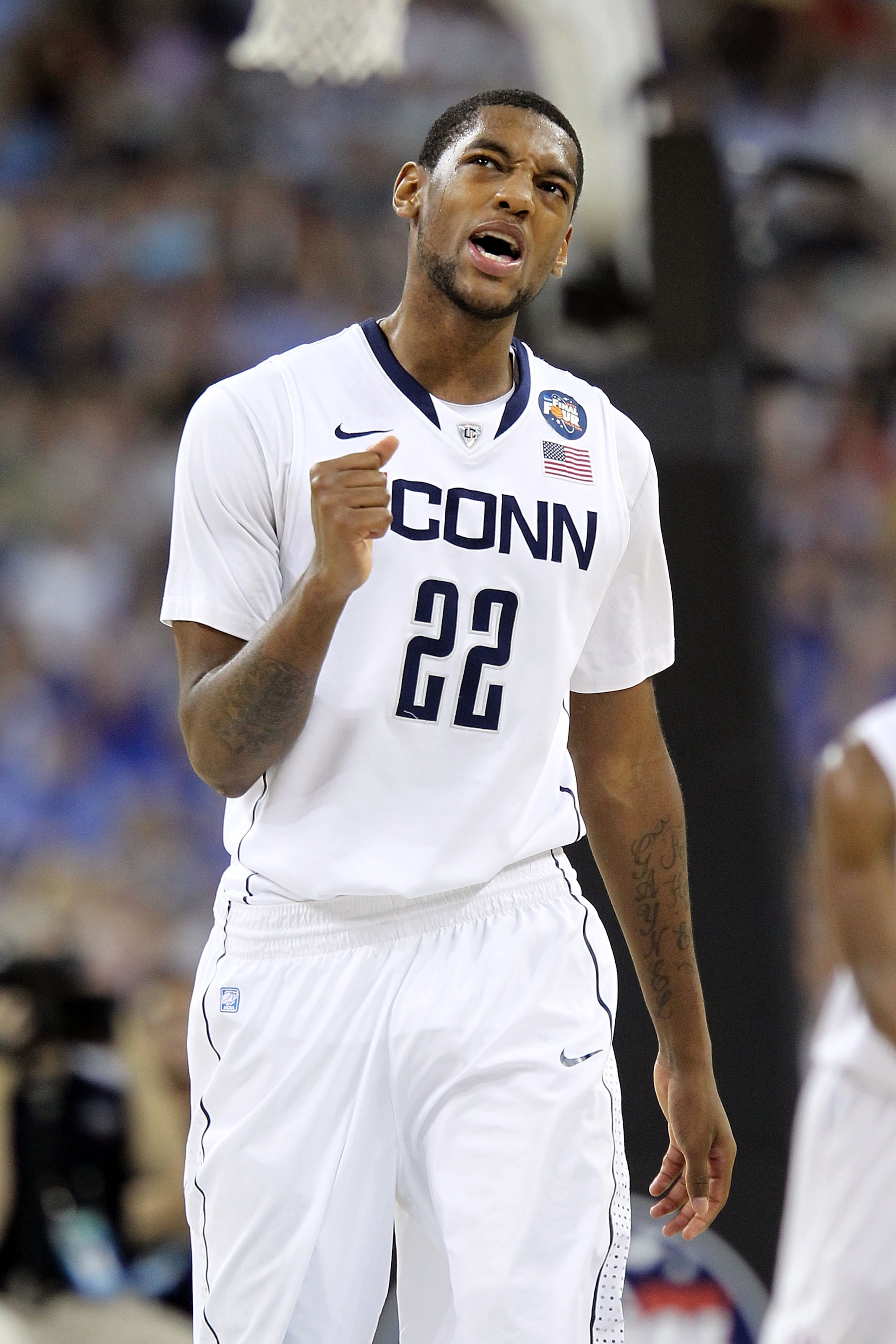 HOUSTON, TX - APRIL 02:  Roscoe Smith #22 of the Connecticut Huskies reacts against the Kentucky Wildcats during the National Semifinal game of the 2011 NCAA Division I Men's Basketball Championship at Reliant Stadium on April 2, 2011 in Houston, Texas.