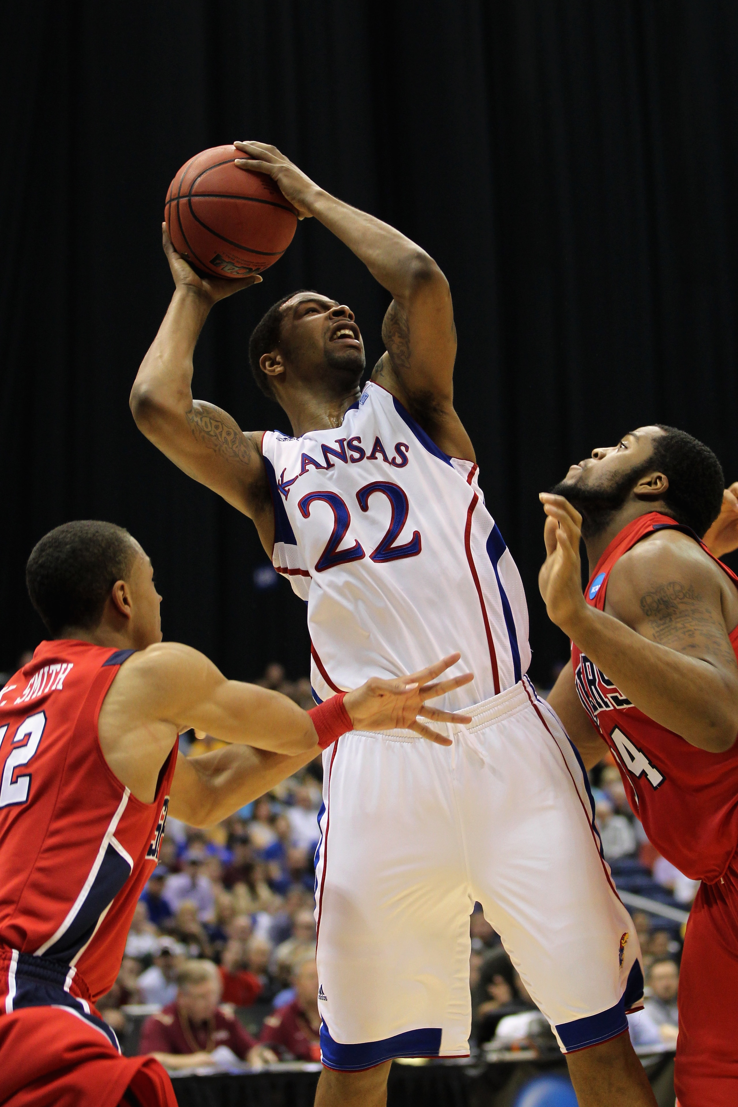 SAN ANTONIO, TX - MARCH 25: Marcus Morris #22 of the Kansas Jayhawks shoots against the Richmond Spiders during the southwest regional of the 2011 NCAA men's basketball tournament at the Alamodome on March 25, 2011 in San Antonio, Texas. (Photo by Jamie SAN ANTONIO, TX - MARCH 25: Marcus Morris #22 of the Kansas Jayhawks shoots against the Richmond Spiders during the southwest regional of the 2011 NCAA men's basketball tournament at the Alamodome on March 25, 2011 in San Antonio, Texas. (Photo by Jamie