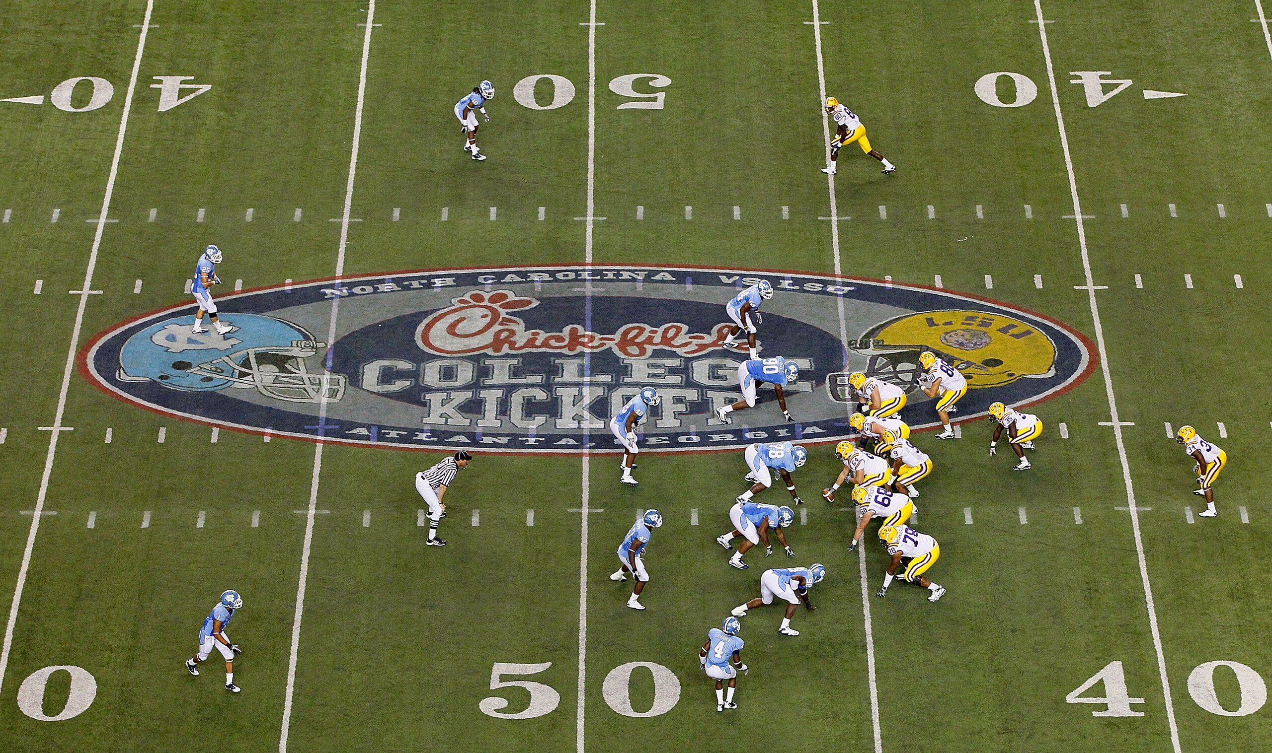 ATLANTA - SEPTEMBER 04:  The offense of the LSU Tigers faces the defense of the North Carolina Tar Heels during the Chick-fil-A Kickoff Game at Georgia Dome on September 4, 2010 in Atlanta, Georgia.  (Photo by Kevin C. Cox/Getty Images)