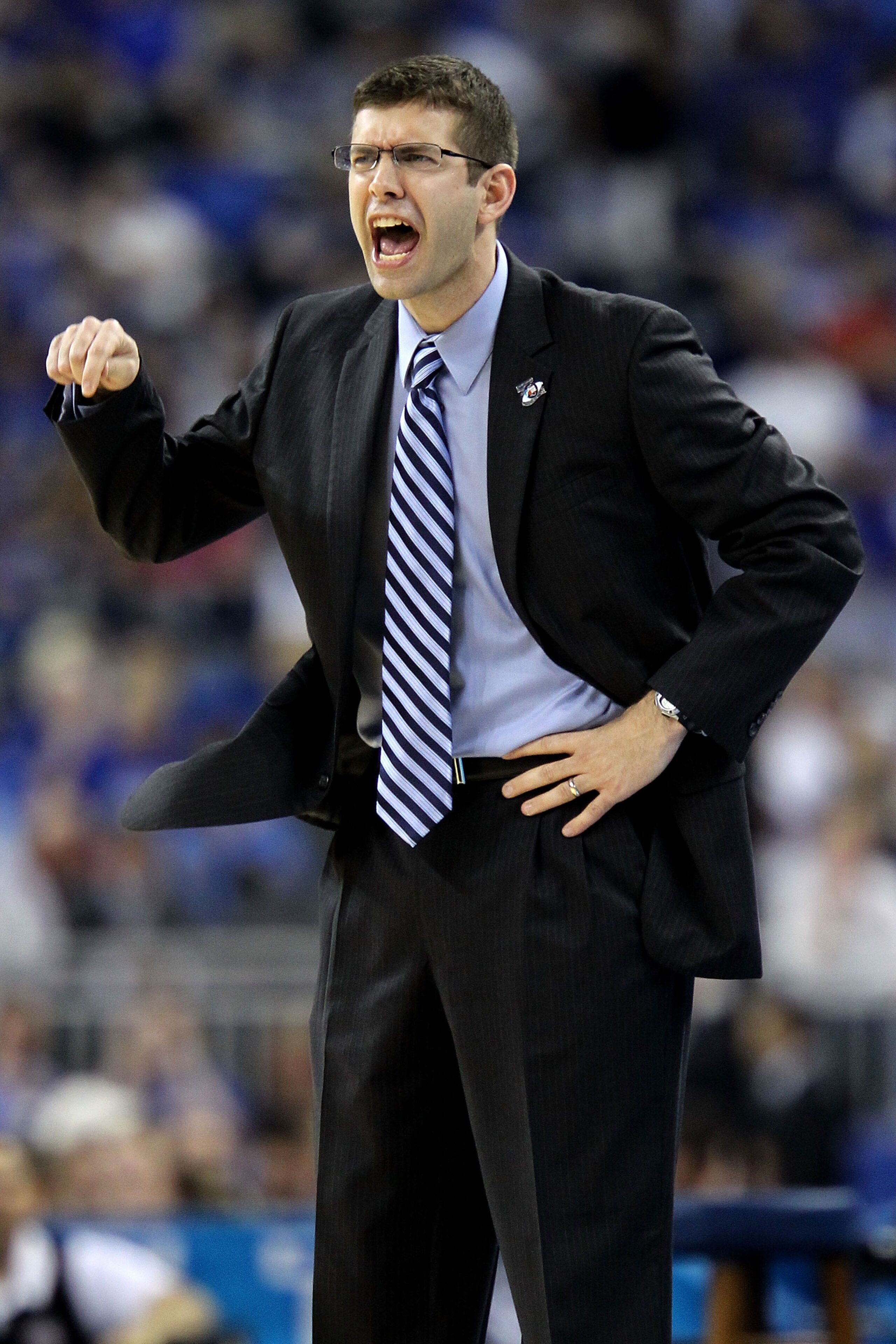 HOUSTON, TX - APRIL 02:  Head coach Brad Stevens of the Butler Bulldogs shouts from the sidelines against the Virginia Commonwealth Rams during the National Semifinal game of the 2011 NCAA Division I Men's Basketball Championship at Reliant Stadium on Apr