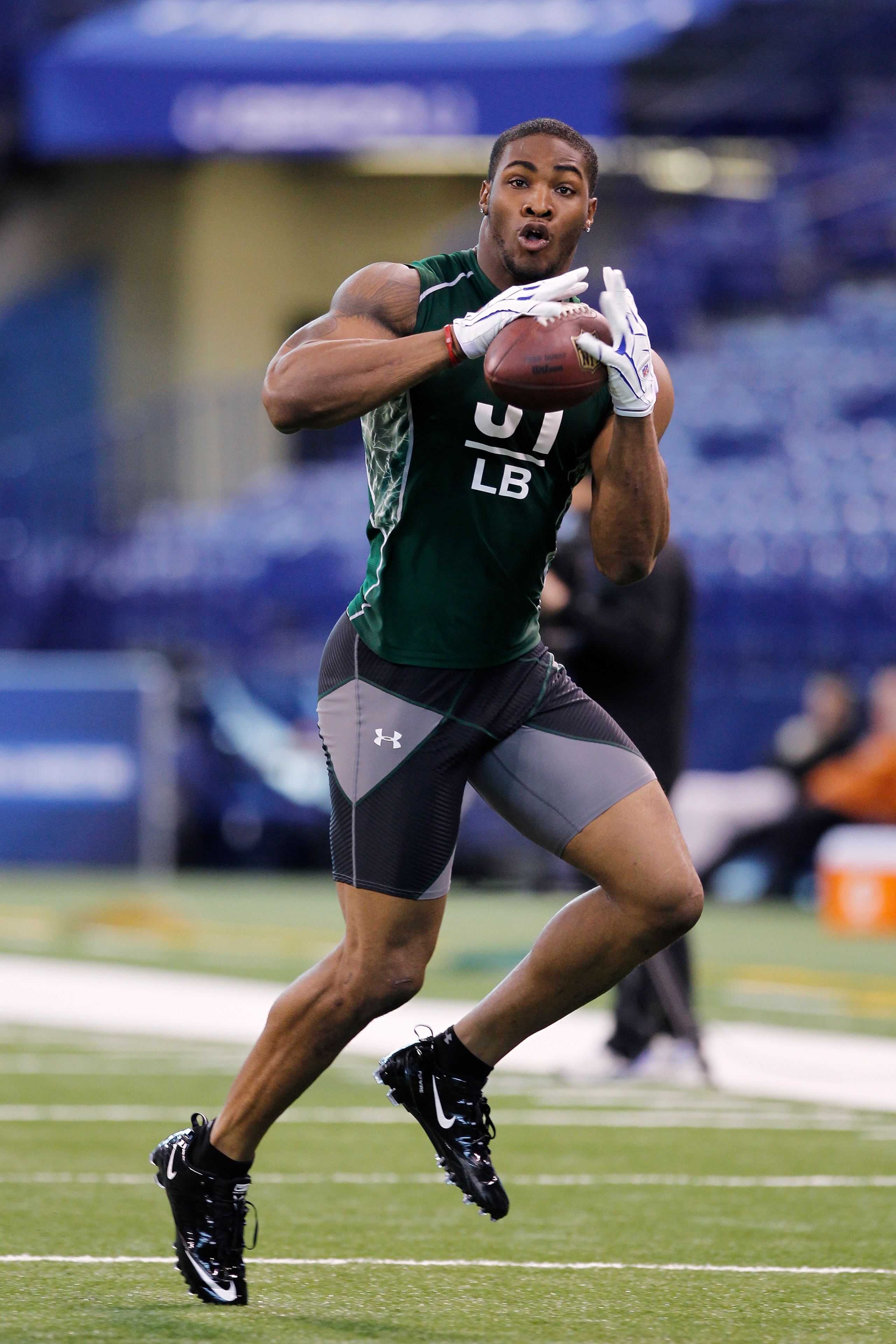 INDIANAPOLIS, IN - FEBRUARY 28: Martez Wilson of Illinois works out during the 2011 NFL Scouting Combine at Lucas Oil Stadium on February 28, 2011 in Indianapolis, Indiana. (Photo by Joe Robbins/Getty Images) INDIANAPOLIS, IN - FEBRUARY 28: Martez Wilson of Illinois works out during the 2011 NFL Scouting Combine at Lucas Oil Stadium on February 28, 2011 in Indianapolis, Indiana. (Photo by Joe Robbins/Getty Images)