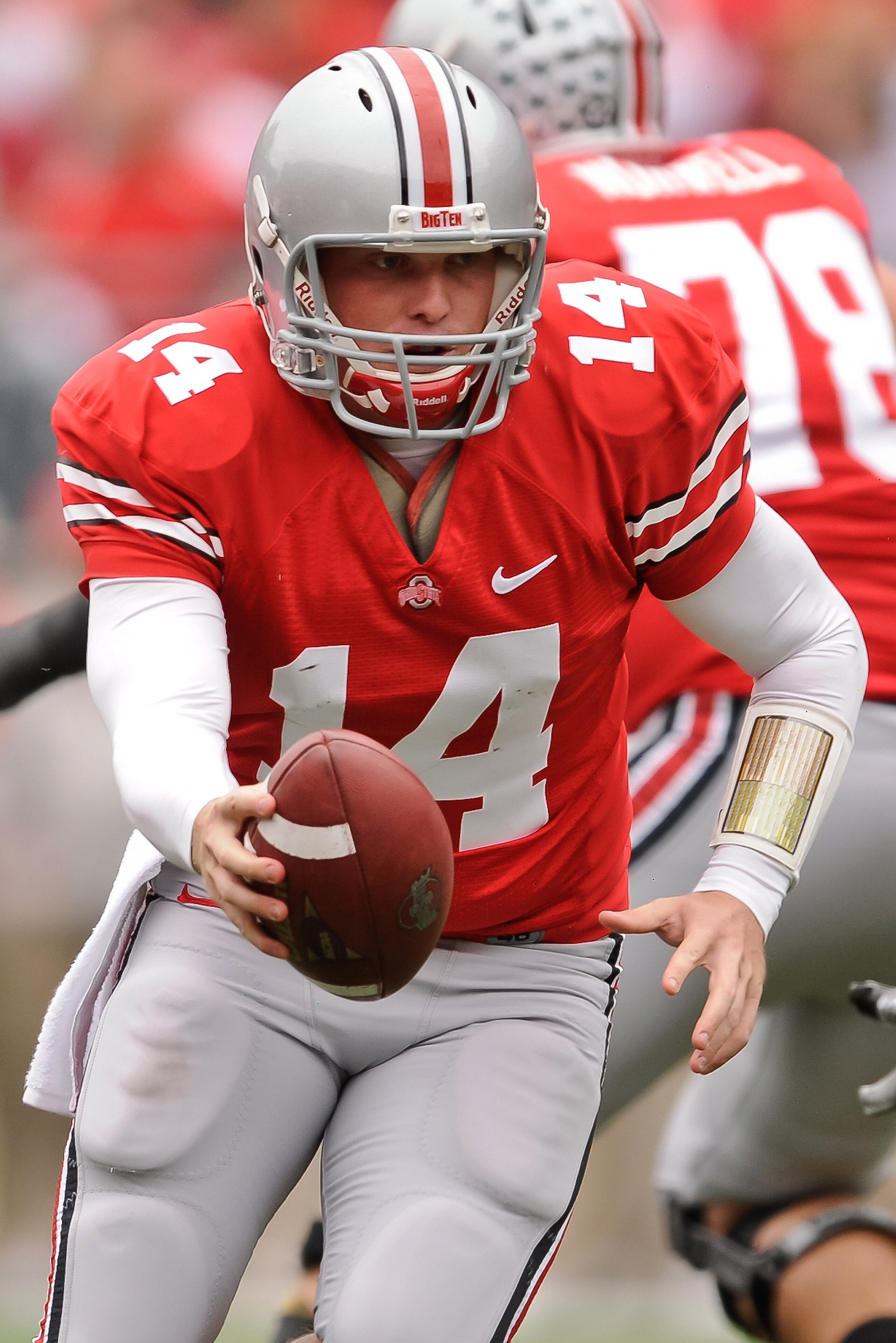 COLUMBUS, OH - OCTOBER 23: Joe Bauserman #14 of the Ohio State Buckeyes hands off the ball against the Purdue Boilermakers at Ohio Stadium on October 23, 2010 in Columbus, Ohio. (Photo by Jamie Sabau/Getty Images) COLUMBUS, OH - OCTOBER 23: Joe Bauserman #14 of the Ohio State Buckeyes hands off the ball against the Purdue Boilermakers at Ohio Stadium on October 23, 2010 in Columbus, Ohio. (Photo by Jamie Sabau/Getty Images)