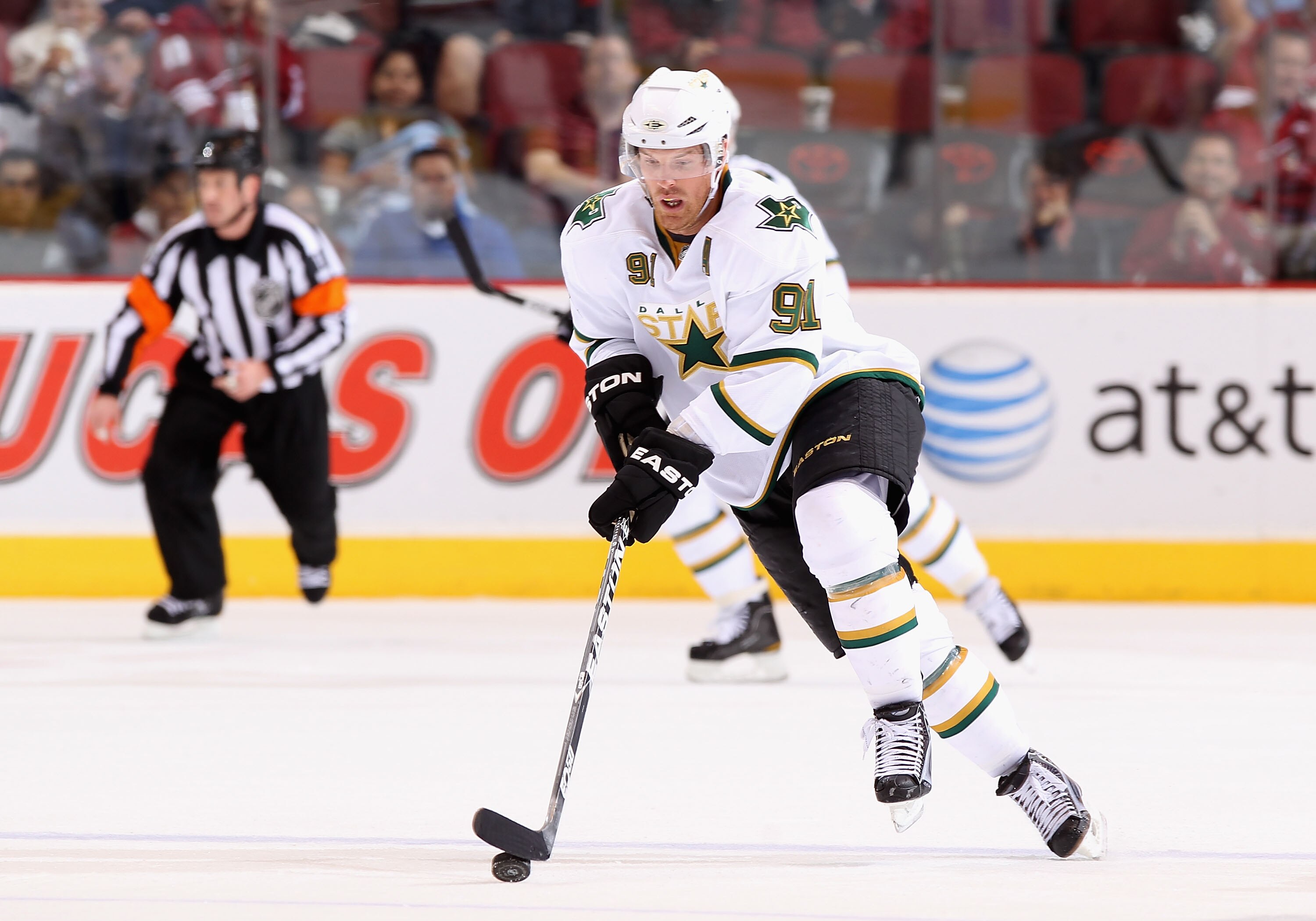 GLENDALE, AZ - MARCH 29:  Brad Richards #91 of the Dallas Stars skates with the puck during the NHL game against the Phoenix Coyotes at Jobing.com Arena on March 29, 2011 in Glendale, Arizona. The Coyotes defeated the Stars 2-1 in an overtime shoot out.