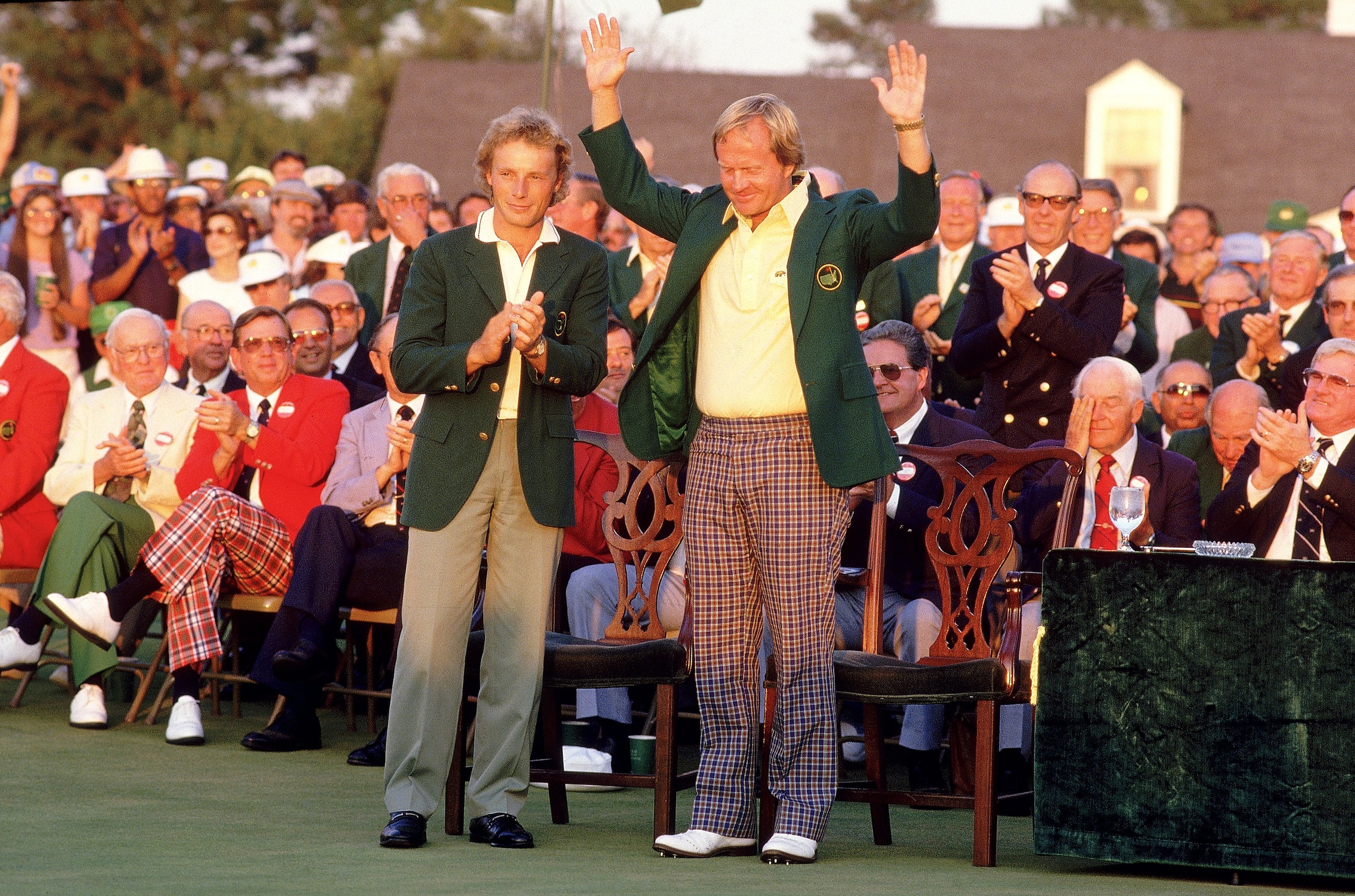 13 Apr 1986:  Jack Nicklaus of the USA receives the Green Jacket from previous winner Bernhard Langer of Germany after victory in the US Masters at Augusta National in Georgia, USA. Mandatory Credit: David Cannon /Allsport