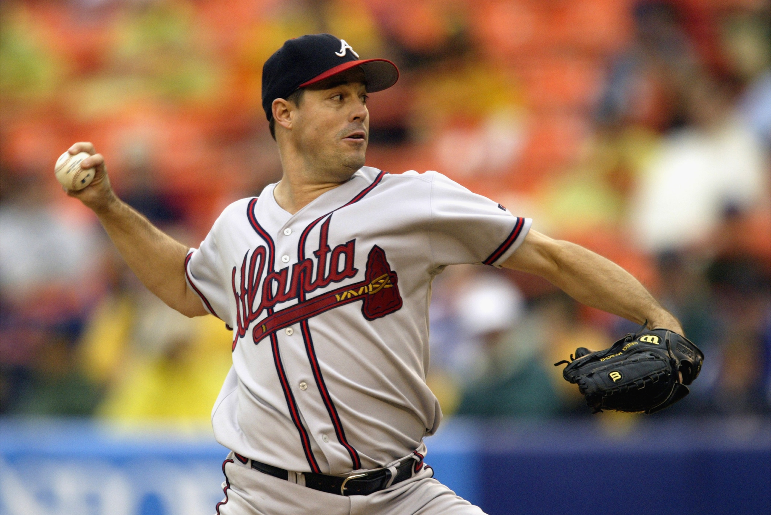 QUEENS, NY- SEPTEMBER 1: Greg Maddux #31 of the Atlanta Braves pitches against the New York Mets during the game at Shea Stadium on September 1, 2003 in Queens, New York. The Mets defeated the Braves 3-2. (Photo by Chris Trotman/Getty Images) QUEENS, NY- SEPTEMBER 1: Greg Maddux #31 of the Atlanta Braves pitches against the New York Mets during the game at Shea Stadium on September 1, 2003 in Queens, New York. The Mets defeated the Braves 3-2. (Photo by Chris Trotman/Getty Images)
