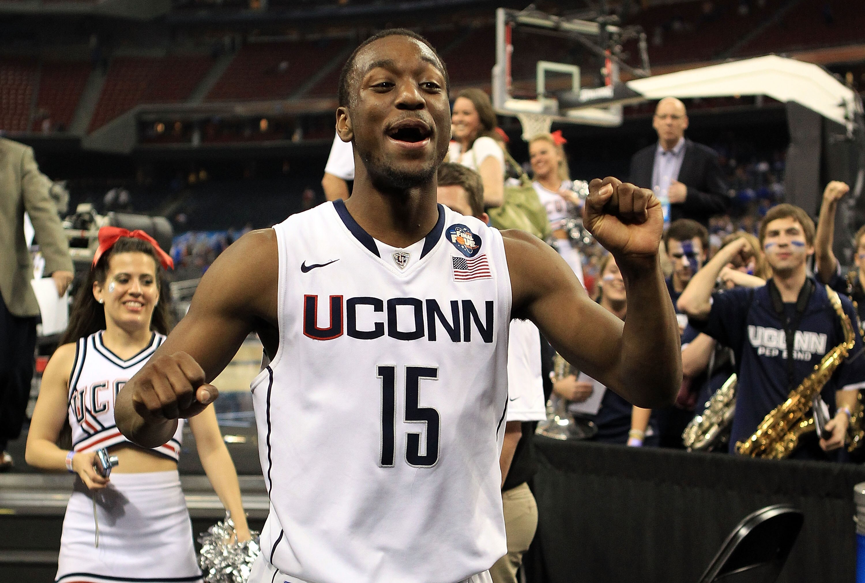 HOUSTON, TX - APRIL 02:  Kemba Walker #15 of the Connecticut Huskies celebrates after defeating the Kentucky Wildcats during the National Semifinal game of the 2011 NCAA Division I Men's Basketball Championship at Reliant Stadium on April 2, 2011 in Houst