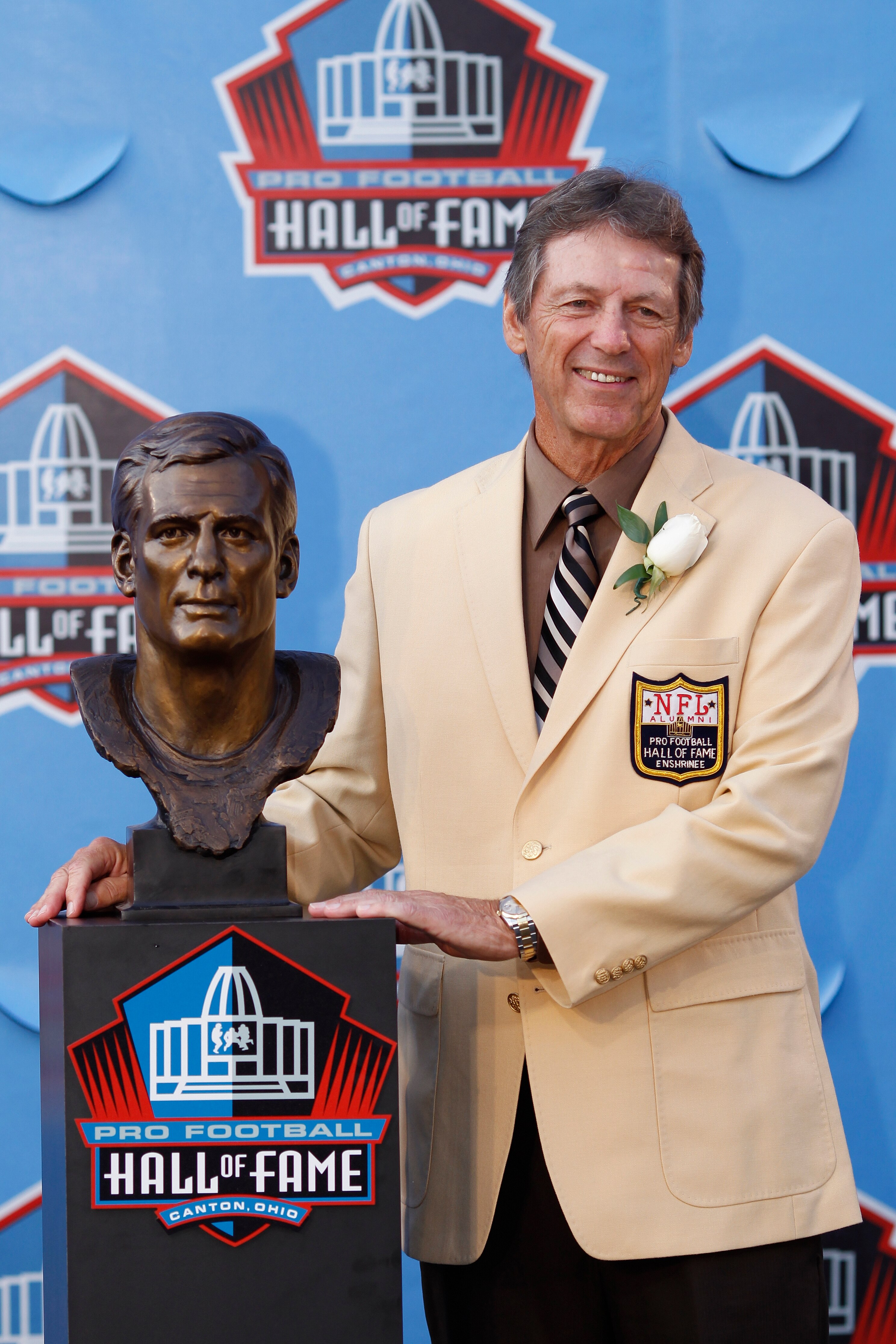 CANTON, OH - AUGUST 7: Dick LeBeau poses with his bust during the 2010 Pro Football Hall of Fame Enshrinement Ceremony at the Pro Football Hall of Fame Field at Fawcett Stadium on August 7, 2010 in Canton, Ohio. (Photo by Joe Robbins/Getty Images)