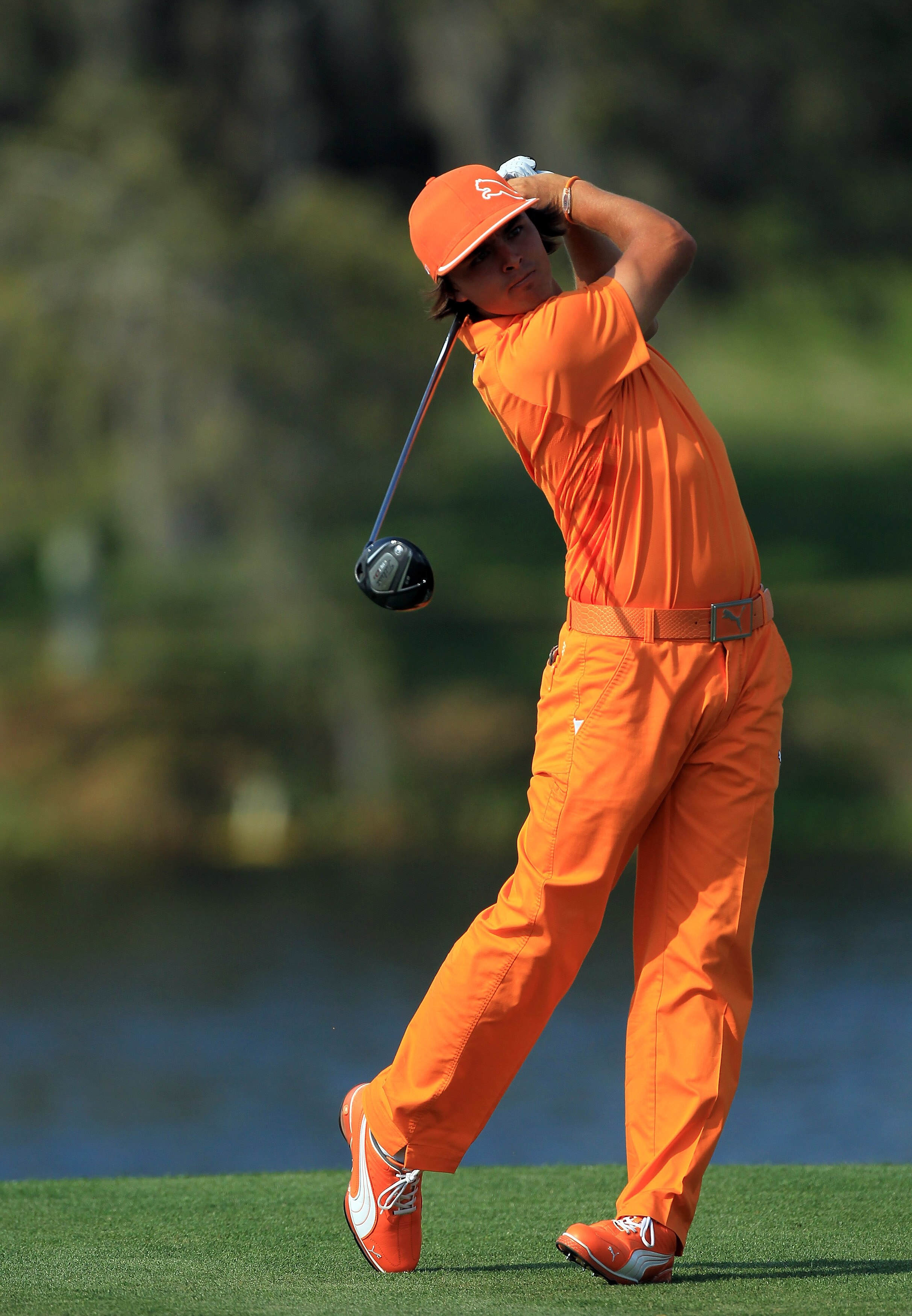 ORLANDO, FL - MARCH 27:  Rickie Fowler of the USA plays his tee shot on the 16th hole during the final round of the 2011 Arnold Palmer Invitational presented by Mastercard at the Bay Hill Lodge and Country Club on March 27, 2011 in Orlando, Florida.  (Pho