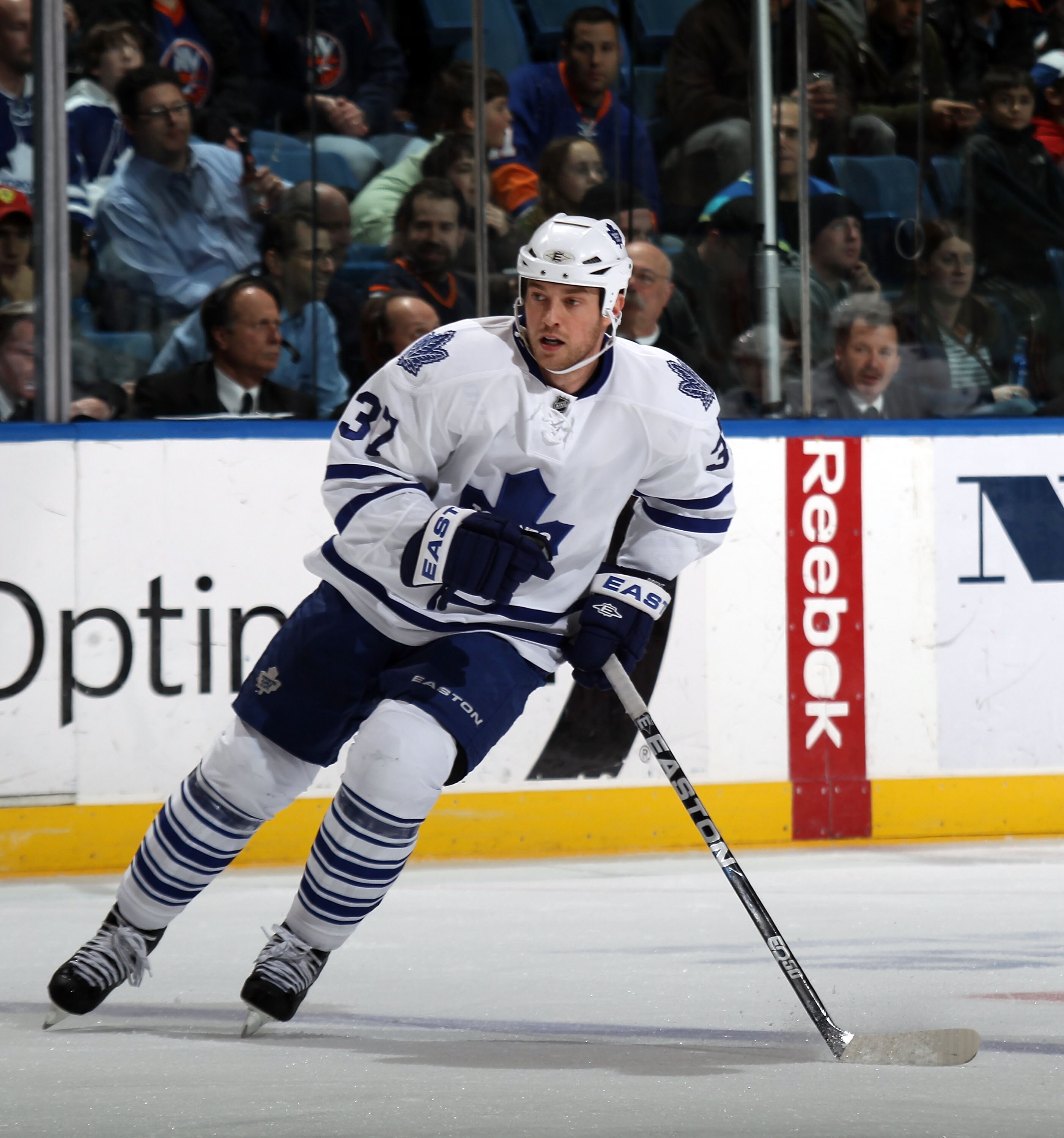UNIONDALE, NY - MARCH 08: Tim Brent #37 of the Toronto Maple Leafs skates against the New York Islanders at the Nassau Coliseum on March 8, 2011 in Uniondale, New York. The Islanders defeated the Leafs 4-3 in overtime.  (Photo by Bruce Bennett/Getty Image