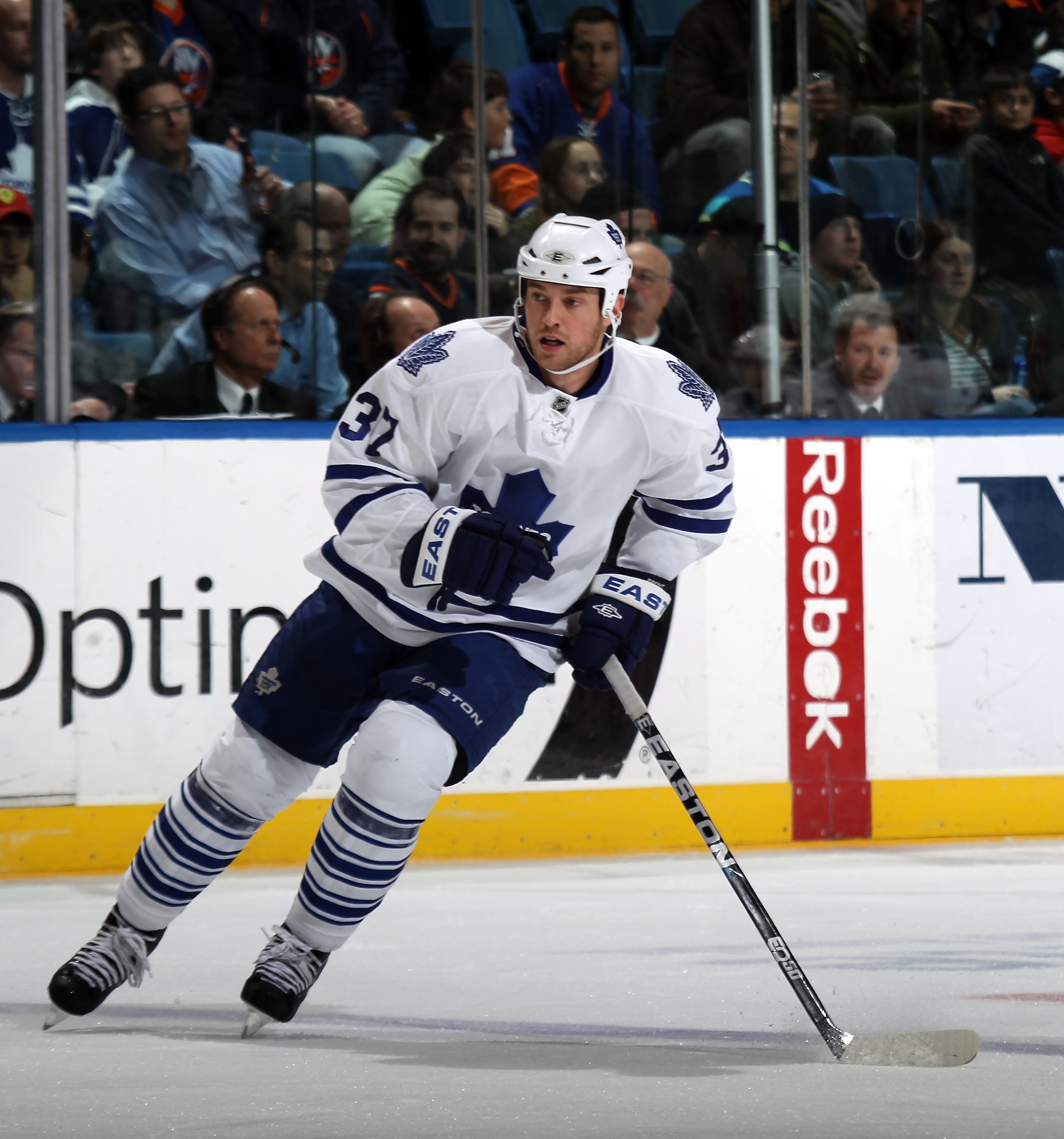 UNIONDALE, NY - MARCH 08: Tim Brent #37 of the Toronto Maple Leafs skates against the New York Islanders at the Nassau Coliseum on March 8, 2011 in Uniondale, New York. The Islanders defeated the Leafs 4-3 in overtime.  (Photo by Bruce Bennett/Getty Image