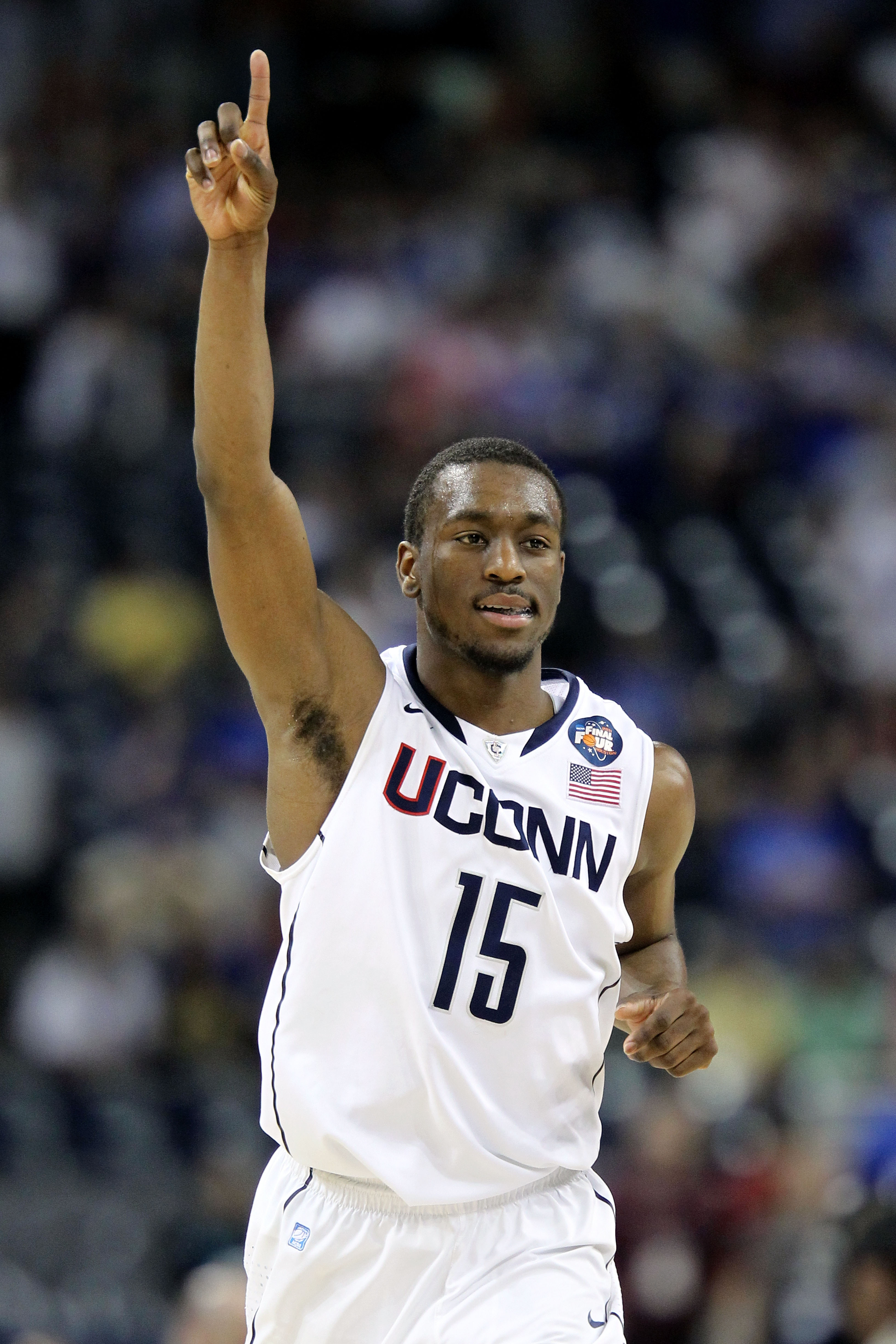 HOUSTON, TX - APRIL 02:  Kemba Walker #15 of the Connecticut Huskies reacts towards the end of the game against the Kentucky Wildcats during the National Semifinal game of the 2011 NCAA Division I Men's Basketball Championship at Reliant Stadium on April