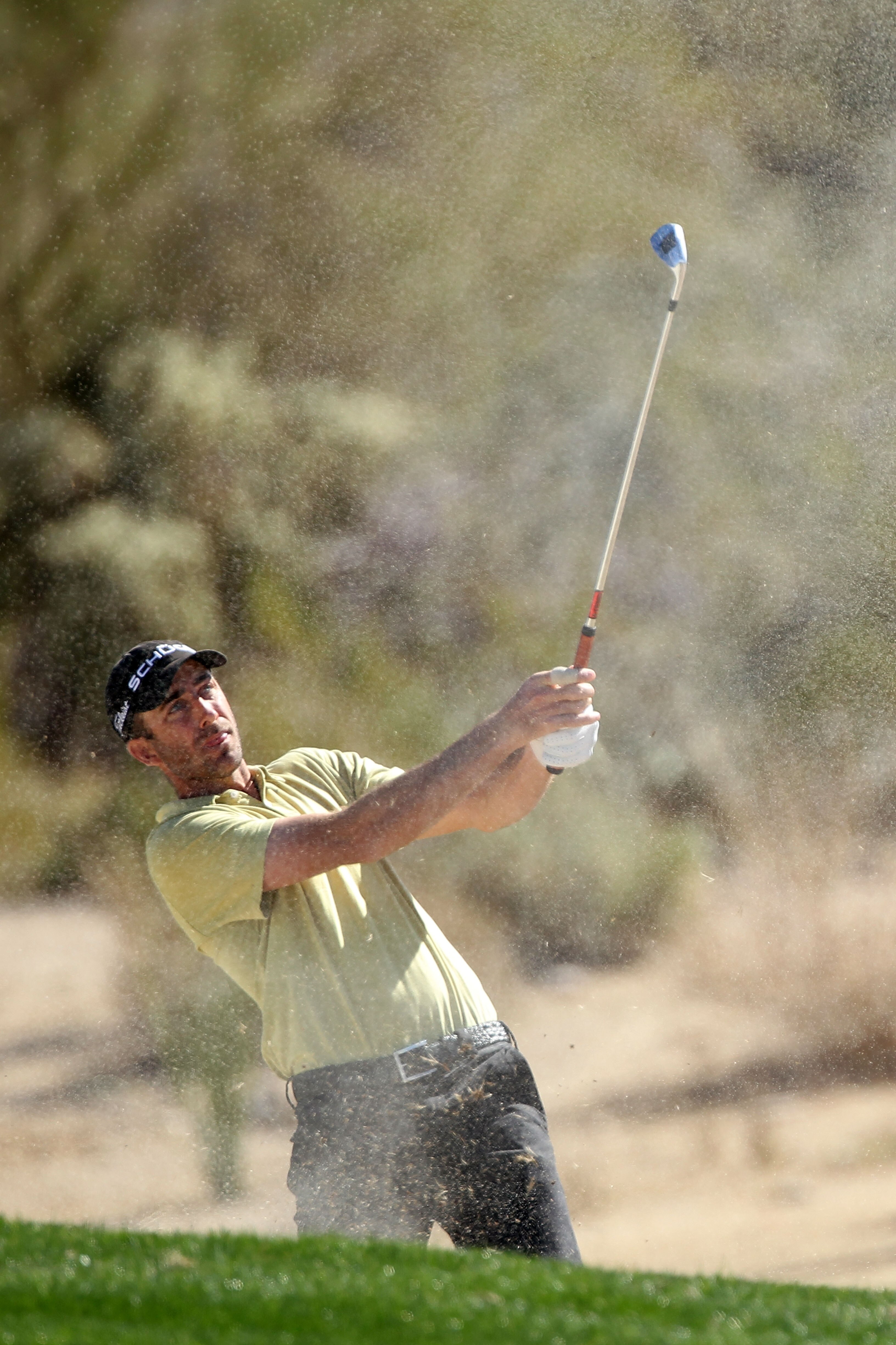 MARANA, AZ - FEBRUARY 25:  Geoff Ogilvy of Australia hits his second shot on the second hole during the third round of the Accenture Match Play Championship at the Ritz-Carlton Golf Club on February 25, 2011 in Marana, Arizona.  (Photo by Andy Lyons/Getty