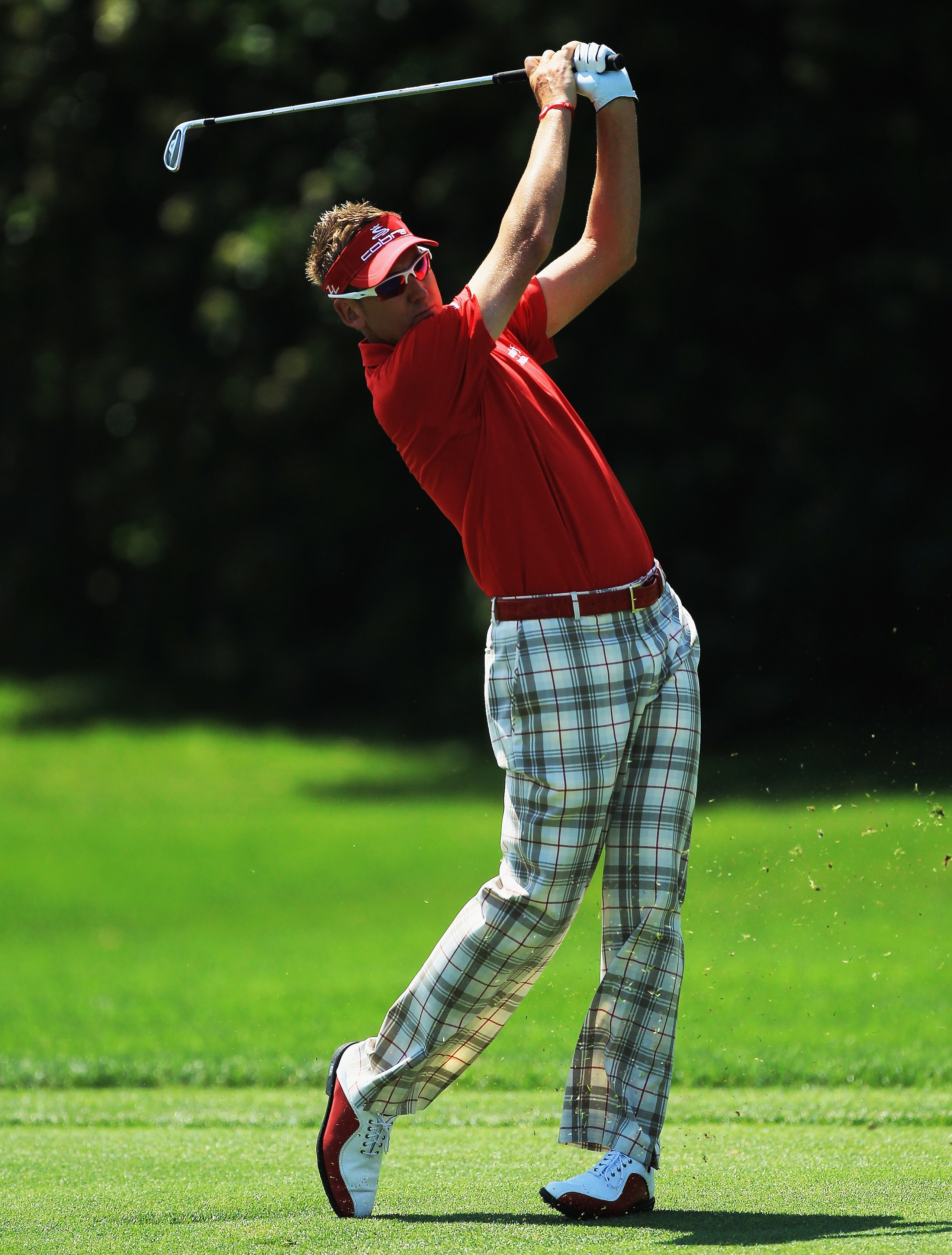 ORLANDO, FL - MARCH 24:  Ian Poulter of England plays his second shot at the 1st hole during the first round of the 2011 Arnold Palmer Invitational presented by Mastercard at the Bay Hill Lodge and Country Club on March 24, 2011 in Orlando, Florida.  (Pho