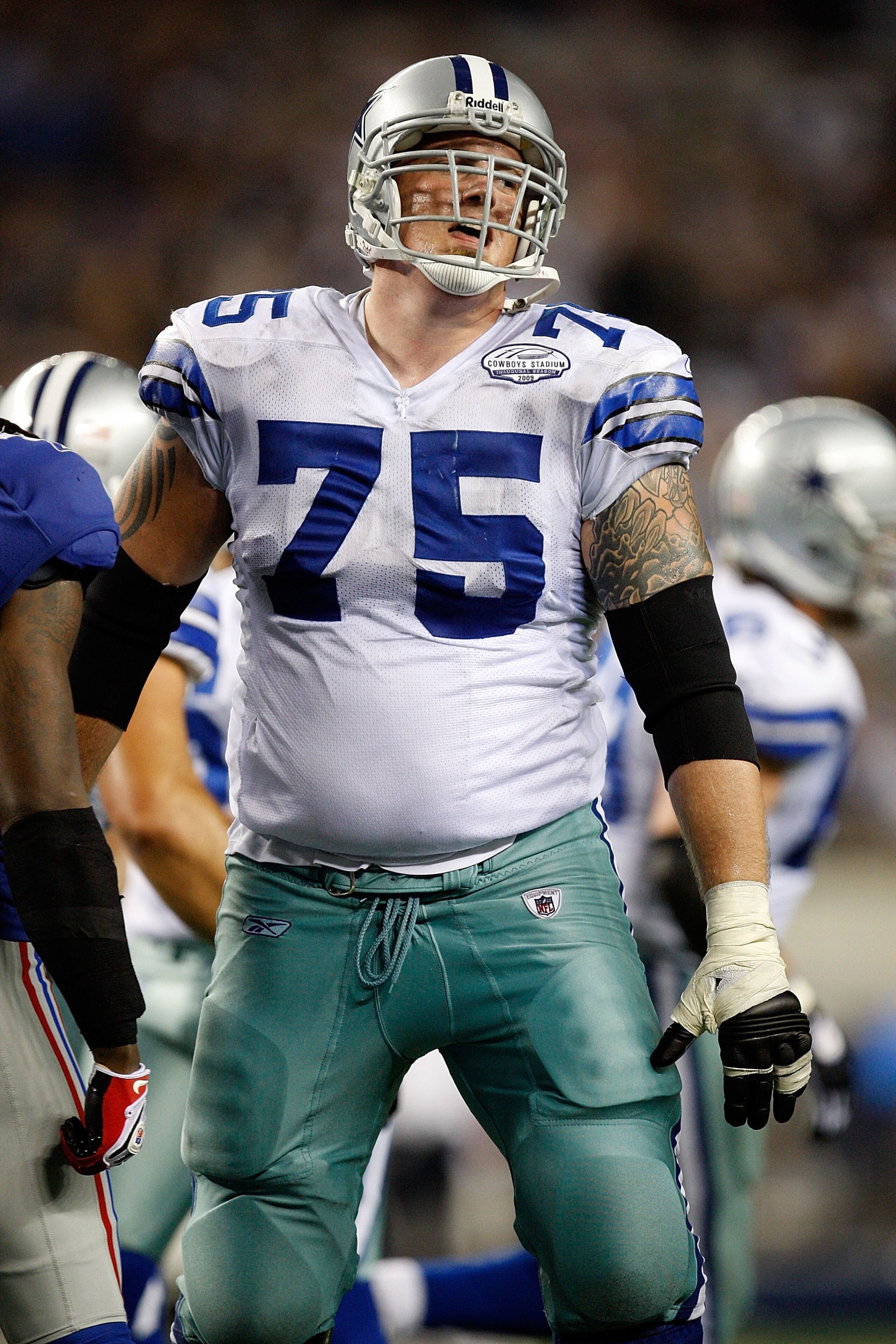ARLINGTON, TX - SEPTEMBER 20: Tackle Marc Colombo #75 of the Dallas Cowboys at Cowboys Stadium on September 20, 2009 in Arlington, Texas. (Photo by Ronald Martinez/Getty Images) ARLINGTON, TX - SEPTEMBER 20: Tackle Marc Colombo #75 of the Dallas Cowboys at Cowboys Stadium on September 20, 2009 in Arlington, Texas. (Photo by Ronald Martinez/Getty Images)