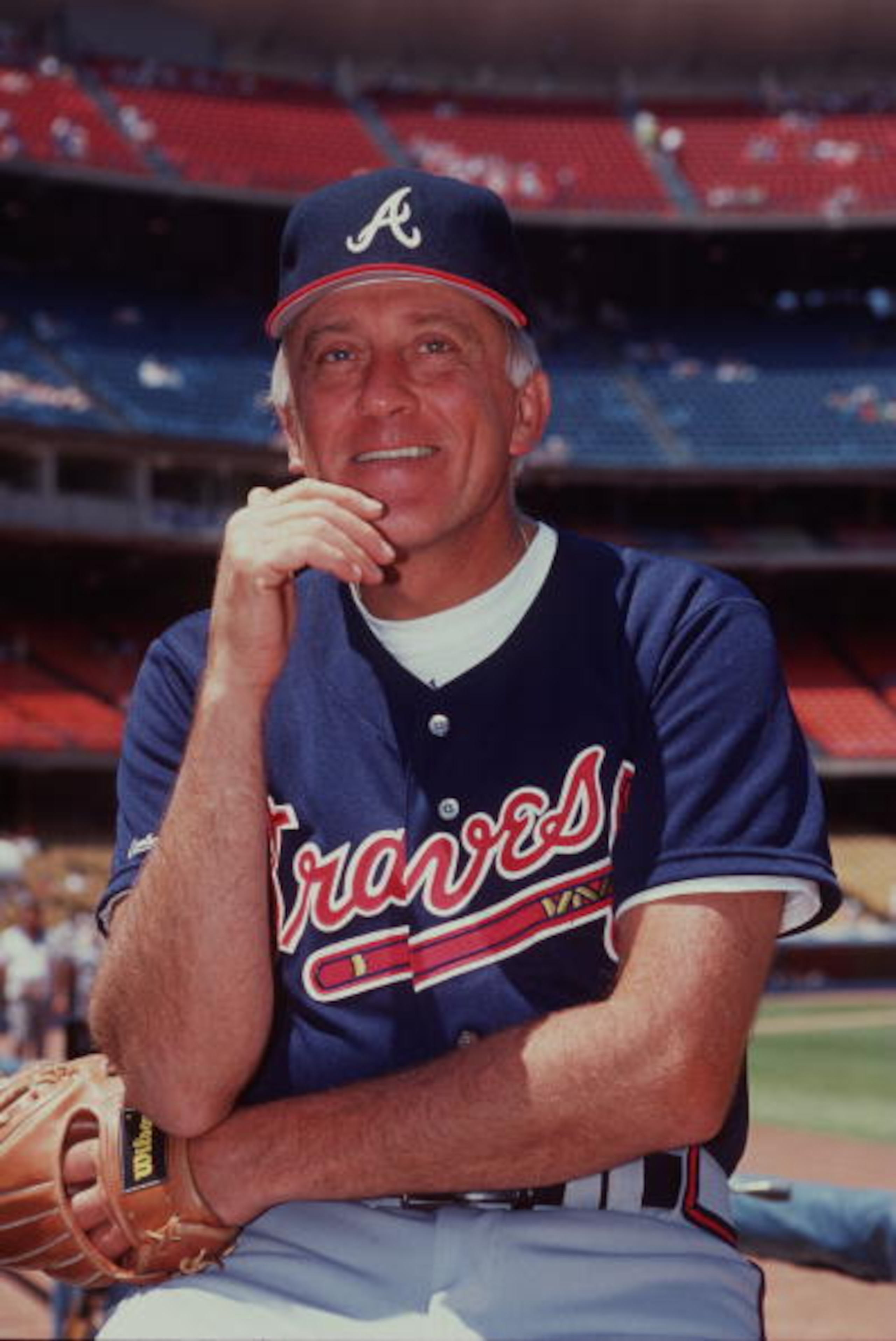 1990: Phil Niekro of the Atlanta Braves poses for a portrait in his uniform on the field of Fulton County stadium in Atlanta, Georgia. Mandatory Credit: Ken Levine/Allsport 1990: Phil Niekro of the Atlanta Braves poses for a portrait in his uniform on the field of Fulton County stadium in Atlanta, Georgia. Mandatory Credit: Ken Levine/Allsport
