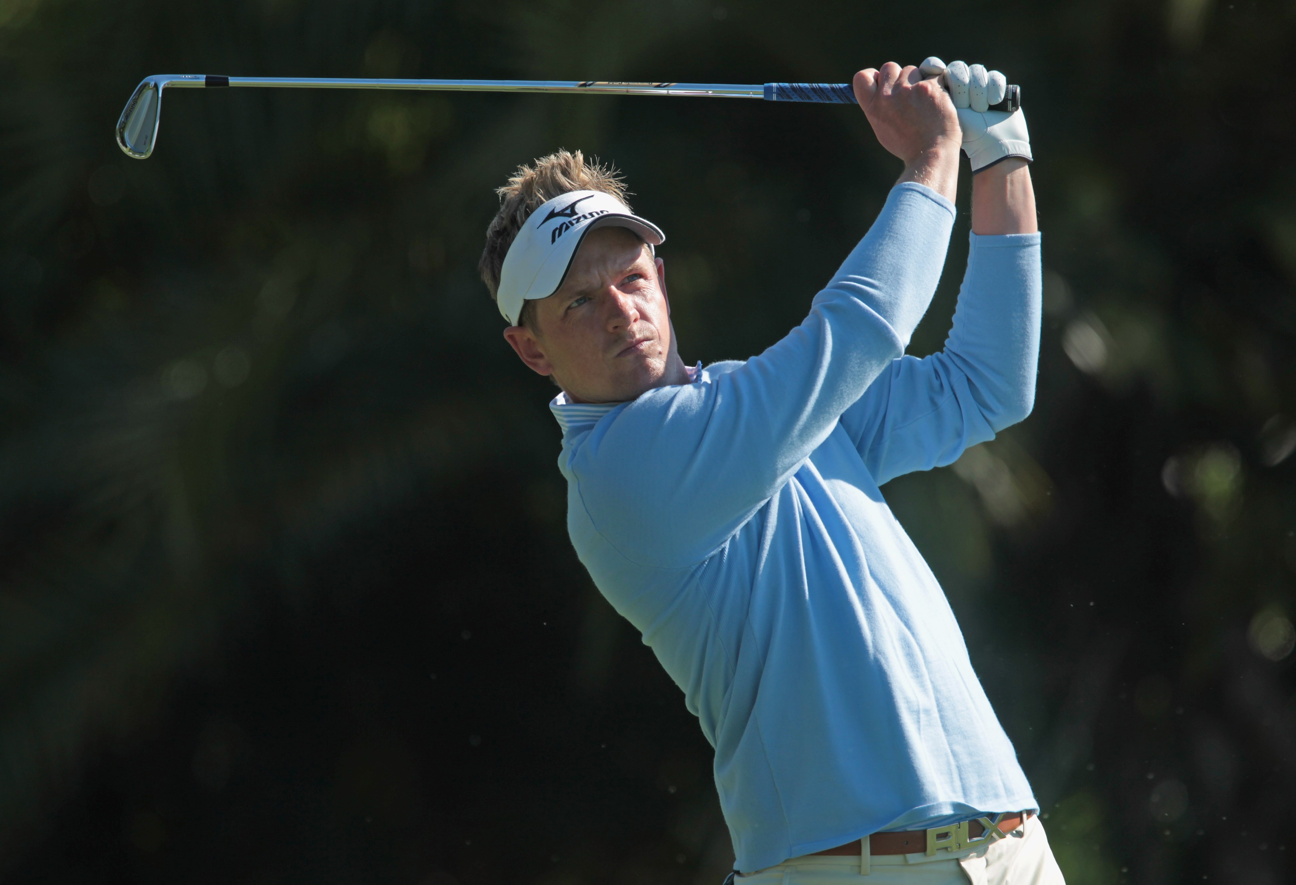 DORAL, FL - MARCH 11:  Luke Donald of England watches his tee shot on the 15th hole during the completion of the first round of the 2011 WGC- Cadillac Championship at the TPC Blue Monster at the Doral Golf Resort and Spa on March 11, 2011 in Doral, Florid
