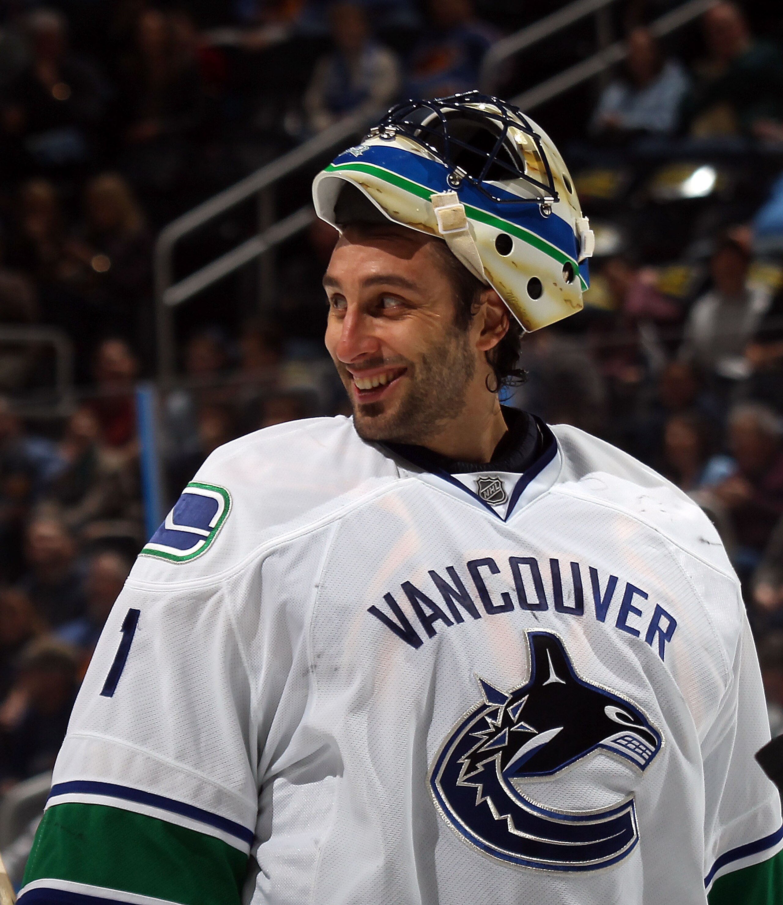 ATLANTA, GA - MARCH 25: Roberto Luongo #1 of the Vancouver Canucks responds to a comment by Dustin Byfuglien #33 of the Atlanta Thrashers during a timeout at the Philips Arena on March 25, 2011 in Atlanta, Georgia. (Photo by Bruce Bennett/Getty Images) ATLANTA, GA - MARCH 25: Roberto Luongo #1 of the Vancouver Canucks responds to a comment by Dustin Byfuglien #33 of the Atlanta Thrashers during a timeout at the Philips Arena on March 25, 2011 in Atlanta, Georgia. (Photo by Bruce Bennett/Getty Images)