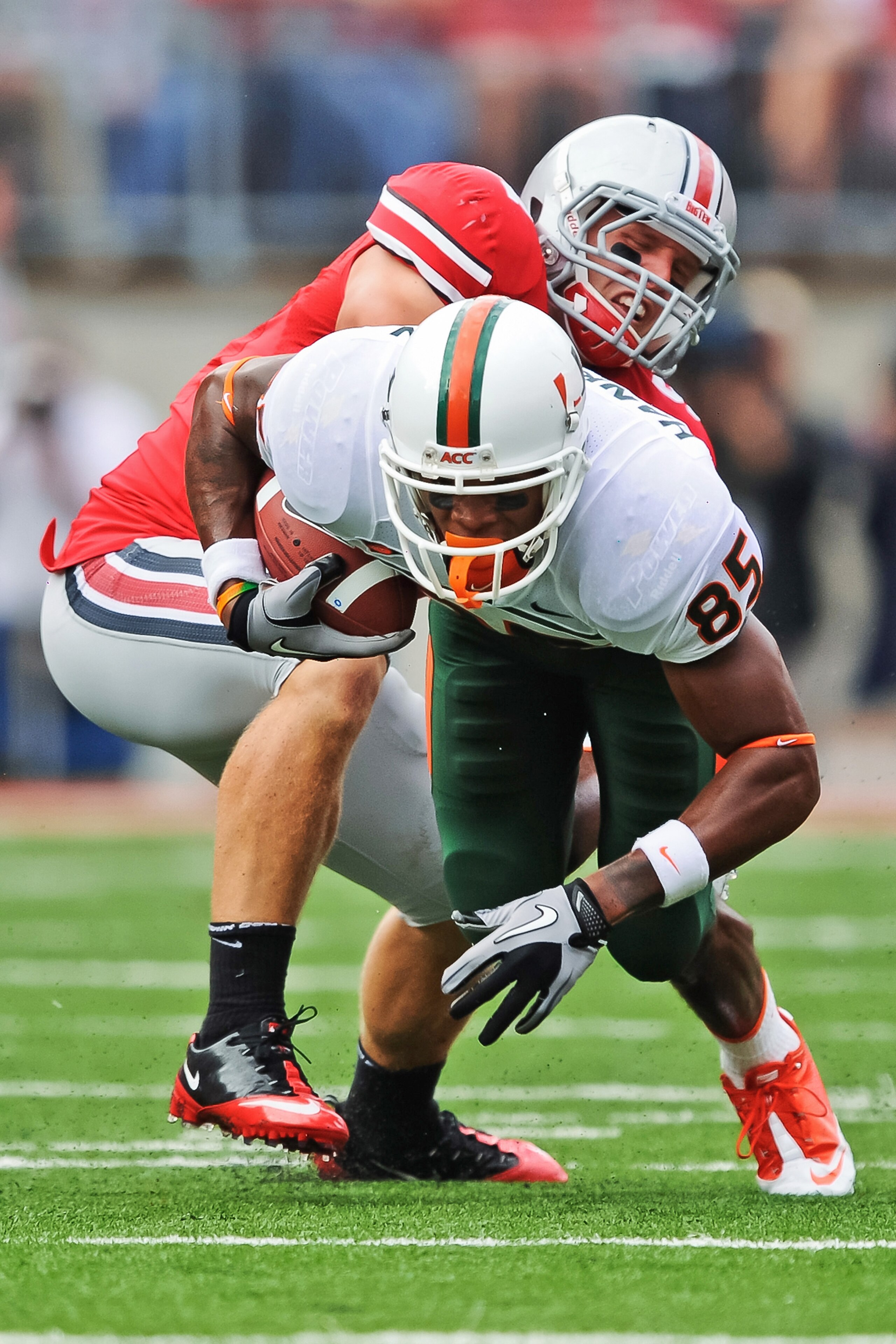 COLUMBUS, OH - SEPTEMBER 11: Ross Homan #51 of the Ohio State Buckeyes tackles Leonard Hankerson #85 of the Miami Hurricanes at Ohio Stadium on September 11, 2010 in Columbus, Ohio. (Photo by Jamie Sabau/Getty Images) COLUMBUS, OH - SEPTEMBER 11: Ross Homan #51 of the Ohio State Buckeyes tackles Leonard Hankerson #85 of the Miami Hurricanes at Ohio Stadium on September 11, 2010 in Columbus, Ohio. (Photo by Jamie Sabau/Getty Images)