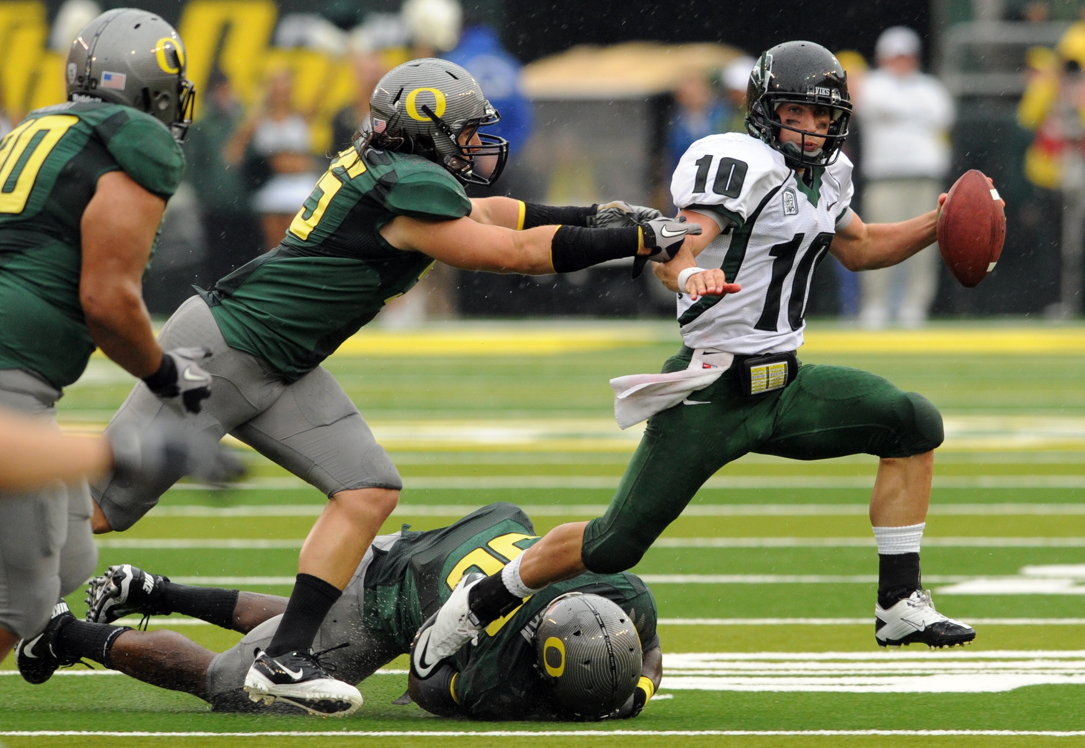 EUGENE, OR - SEPTEMBER 18: Quarterback Connor Kavanaugh #10 of the Portland State sacked by linebacker Casey Matthews #55 of the Oregon Ducks in the second quarter of the game at Autzen Stadium on September 18, 2010 in Eugene, Oregon.  (Photo by Steve Dyk