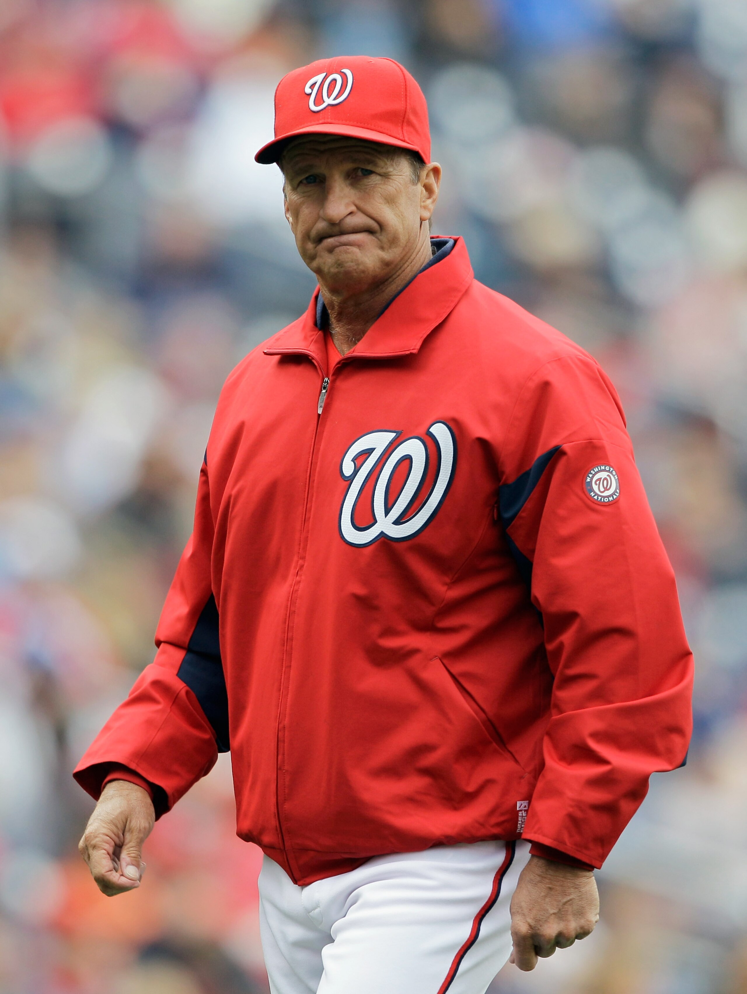 WASHINGTON, DC - APRIL 03: Jim Riggleman #5 manager of the Washington Nationals walks off the field after a pitching change against the Atlanta Braves during the seventh inning at Nationals Park on April 3, 2011 in Washington, DC.  (Photo by Rob Carr/Gett