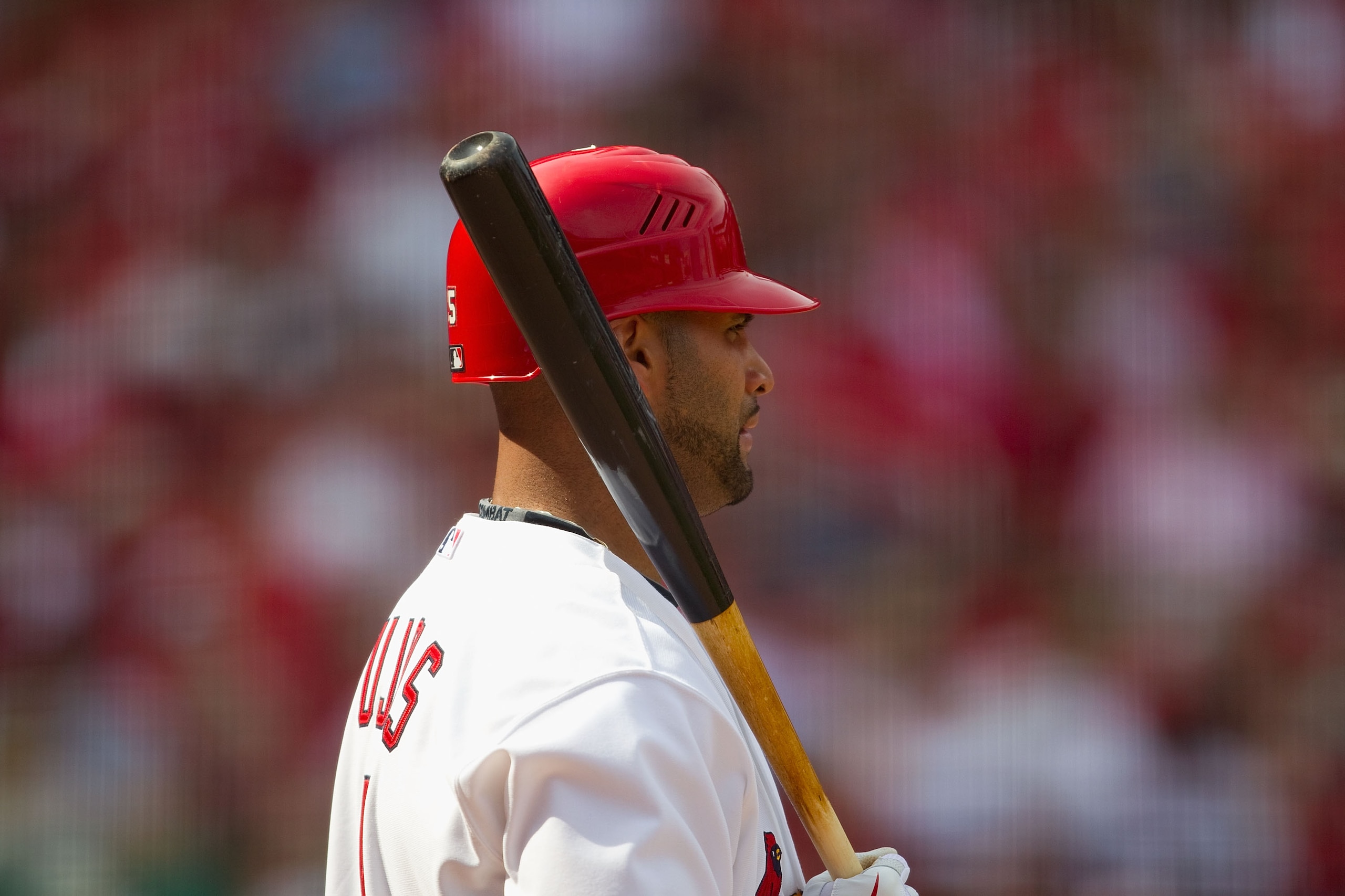 ST. LOUIS, MO - APRIL 3: Albert Pujols #5 of the St. Louis Cardinals waits on deck to bat against the San Diego Padre at Busch Stadium on April 3, 2011 in St. Louis, Missouri.  (Photo by Dilip Vishwanat/Getty Images)