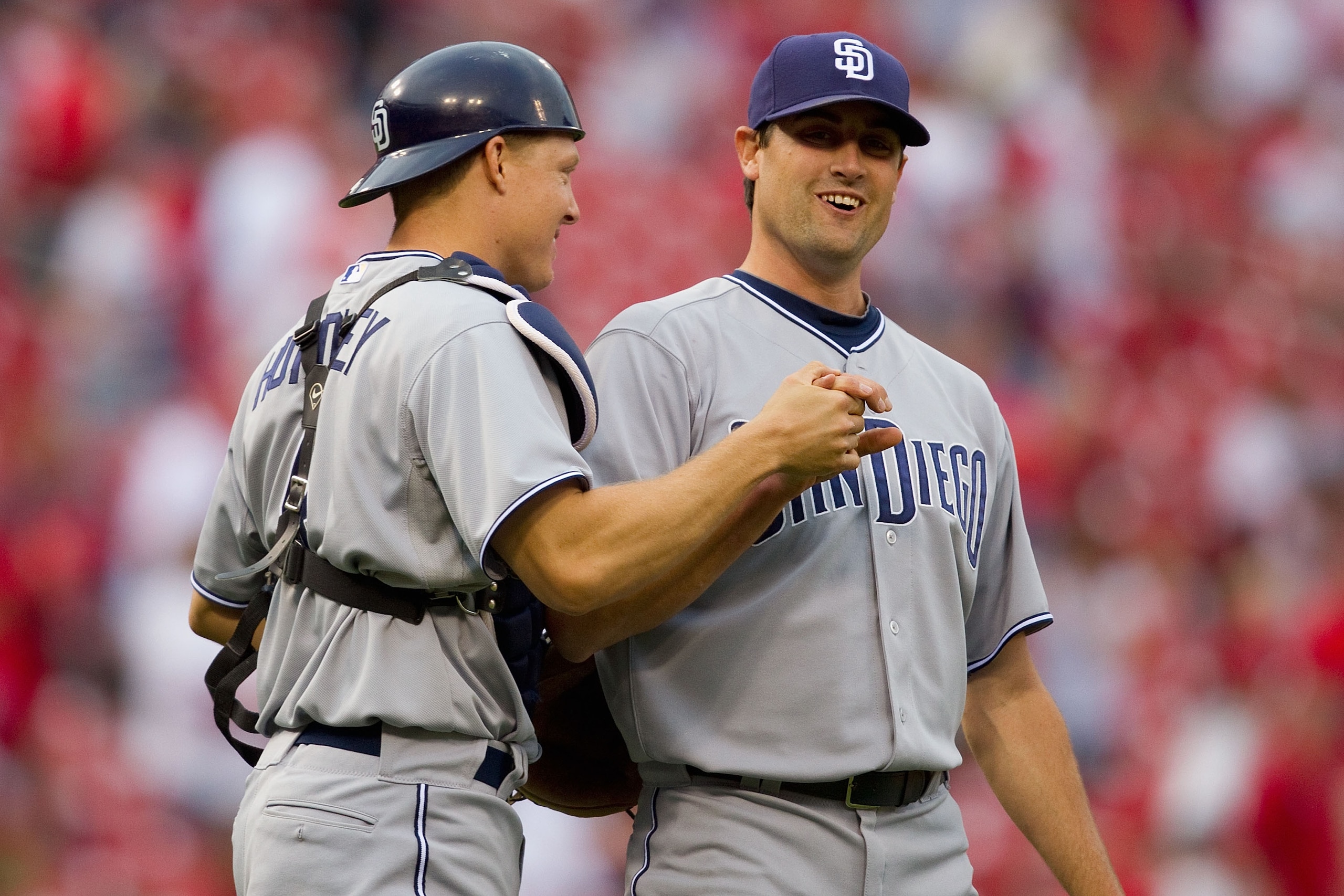 ST. LOUIS, MO - APRIL 2: Nick Hundley #4 and Pat Neshek #34 both of the San Diego Padres congratulate each other after beating the St. Louis Cardinals at Busch Stadium on April 2, 2011 in St. Louis, Missouri.  (Photo by Dilip Vishwanat/Getty Images)